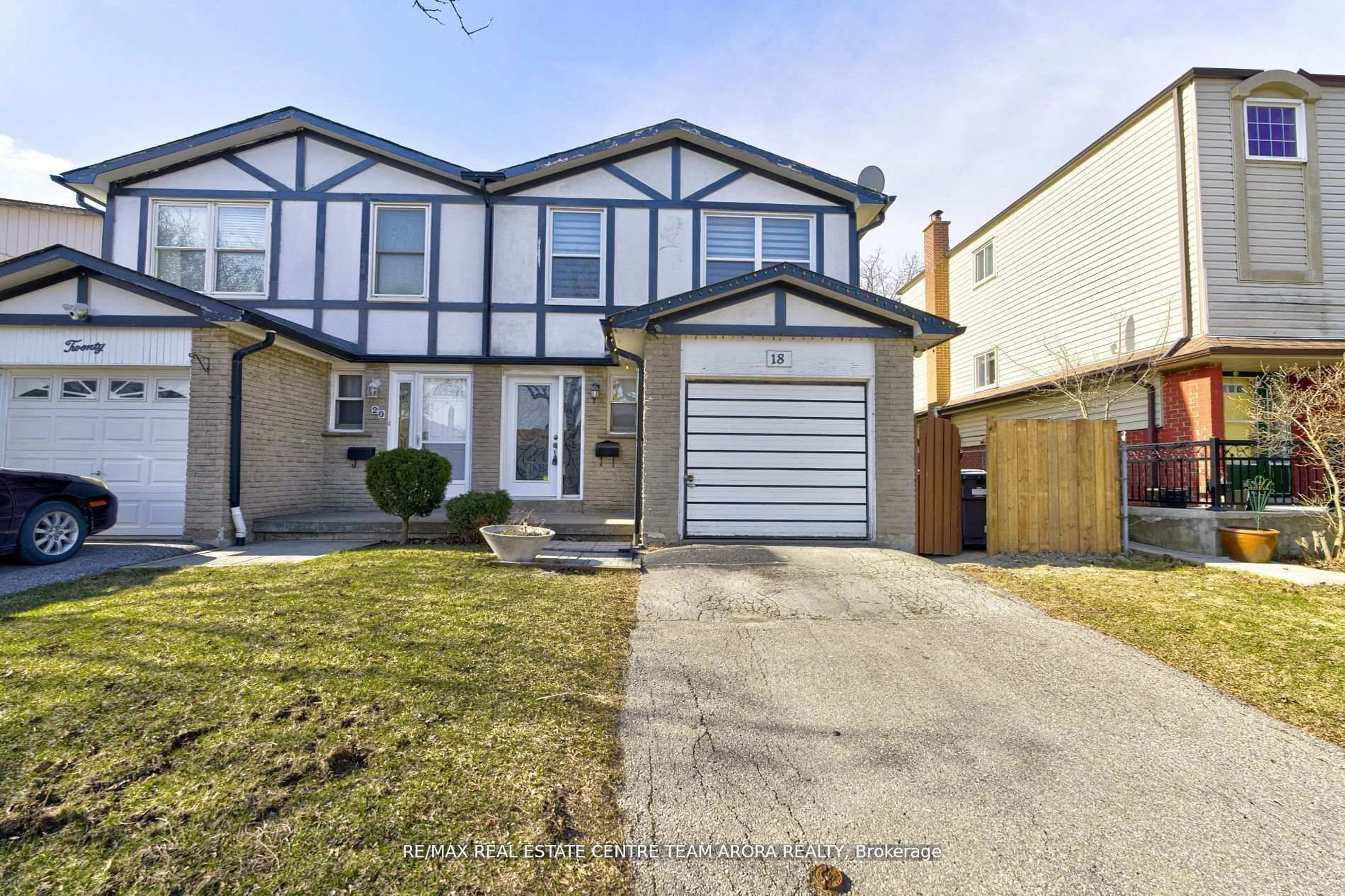 Home with vinyl exterior material, street for 18 Abell Dr, Brampton Ontario L6V 2V8