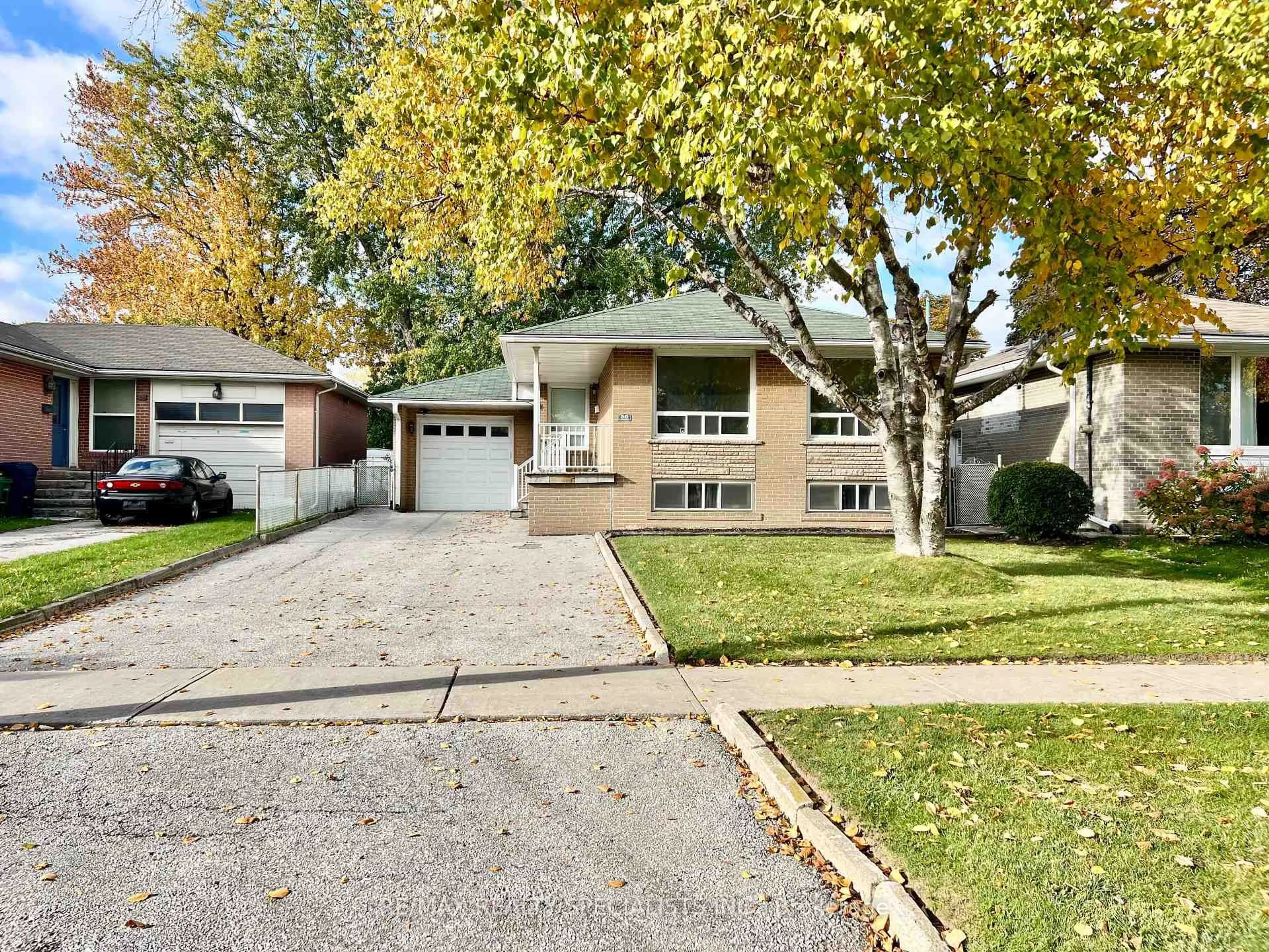 Home with vinyl exterior material, street for 58 Inverdon Rd, Toronto Ontario M9C 4L8