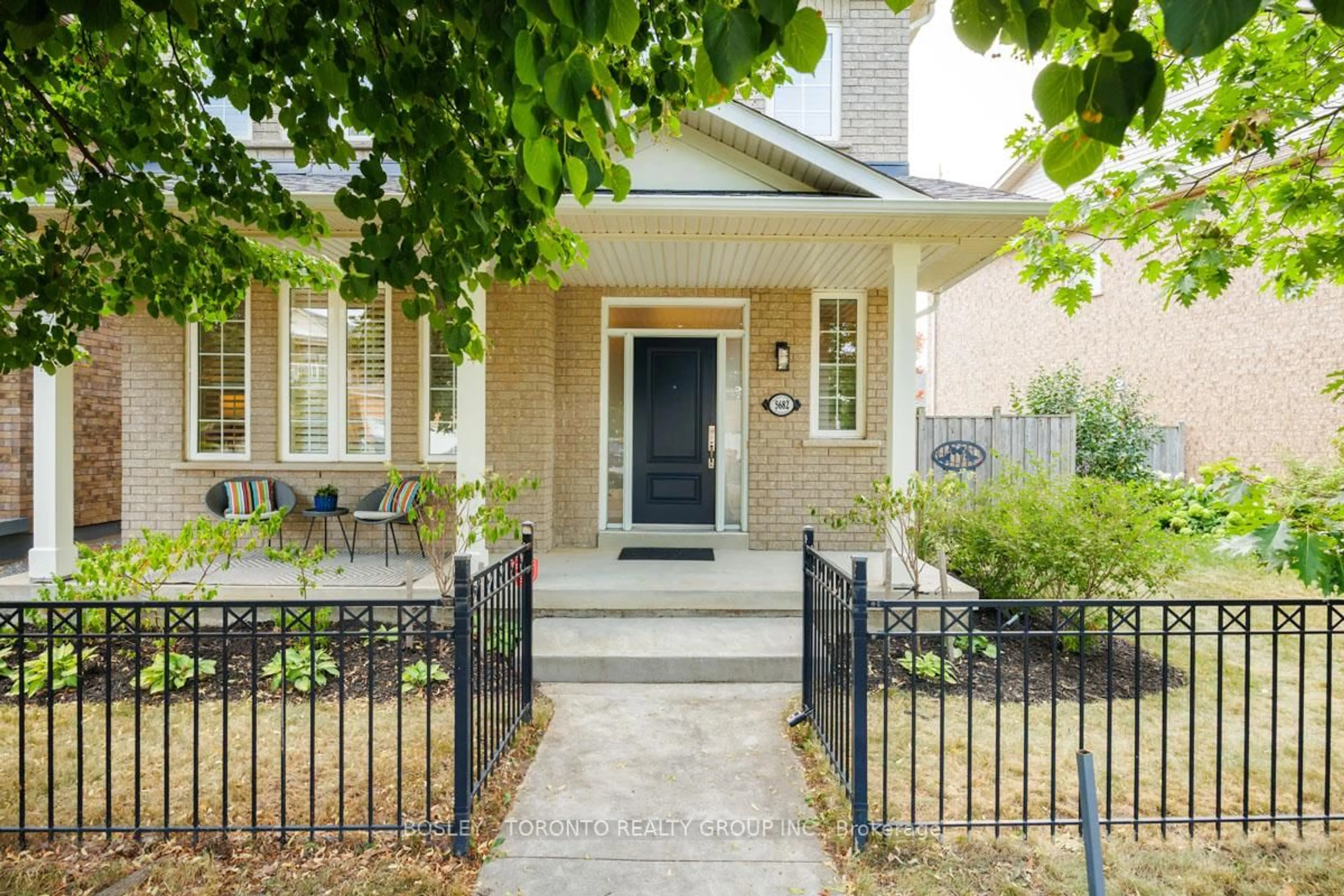 Home with brick exterior material, street for 5682 Passion Flower Blvd, Mississauga Ontario L5M 7E7