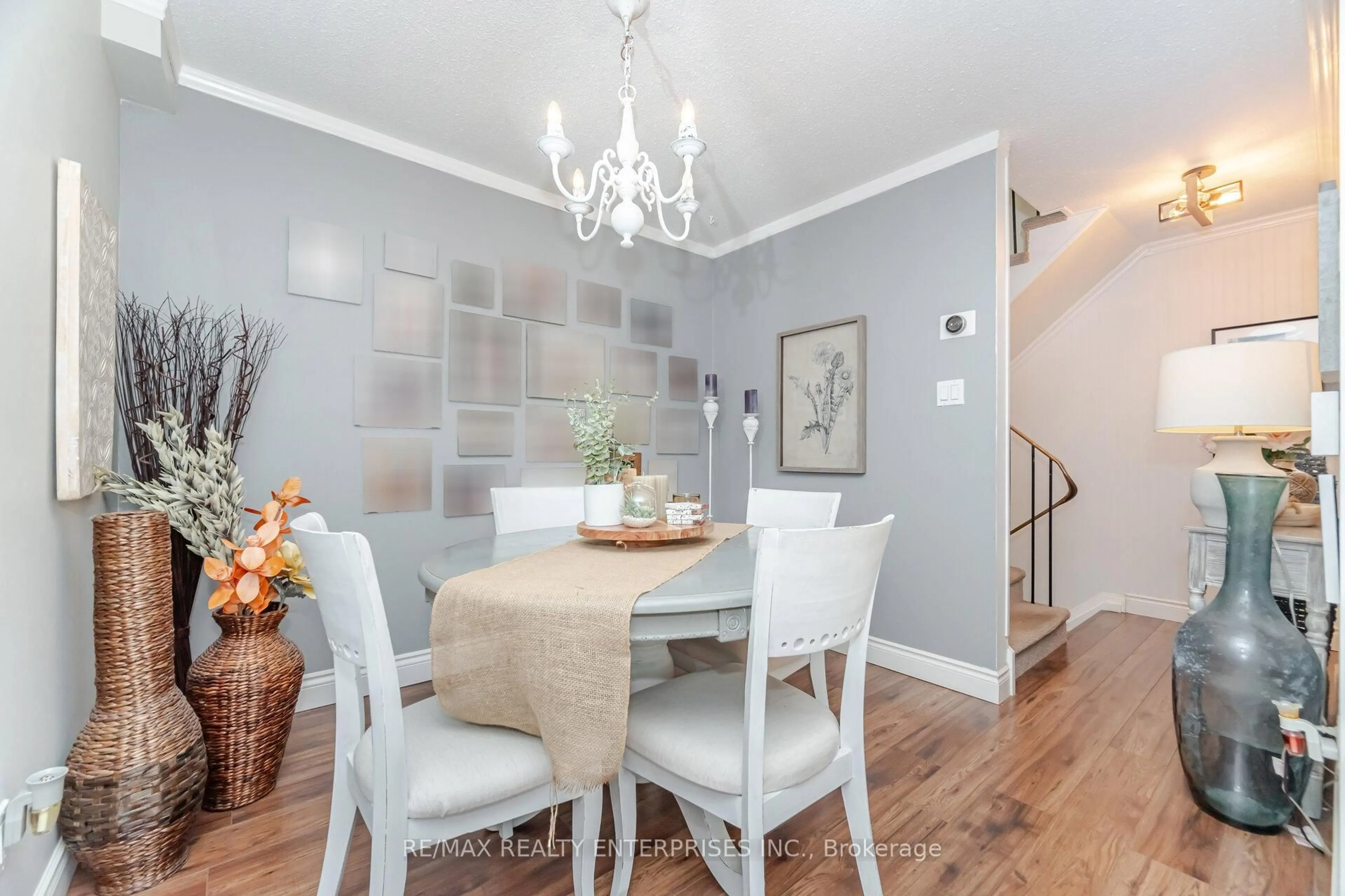 Dining room, wood/laminate floor for 371 Bronte St #110, Milton Ontario L9T 3K5