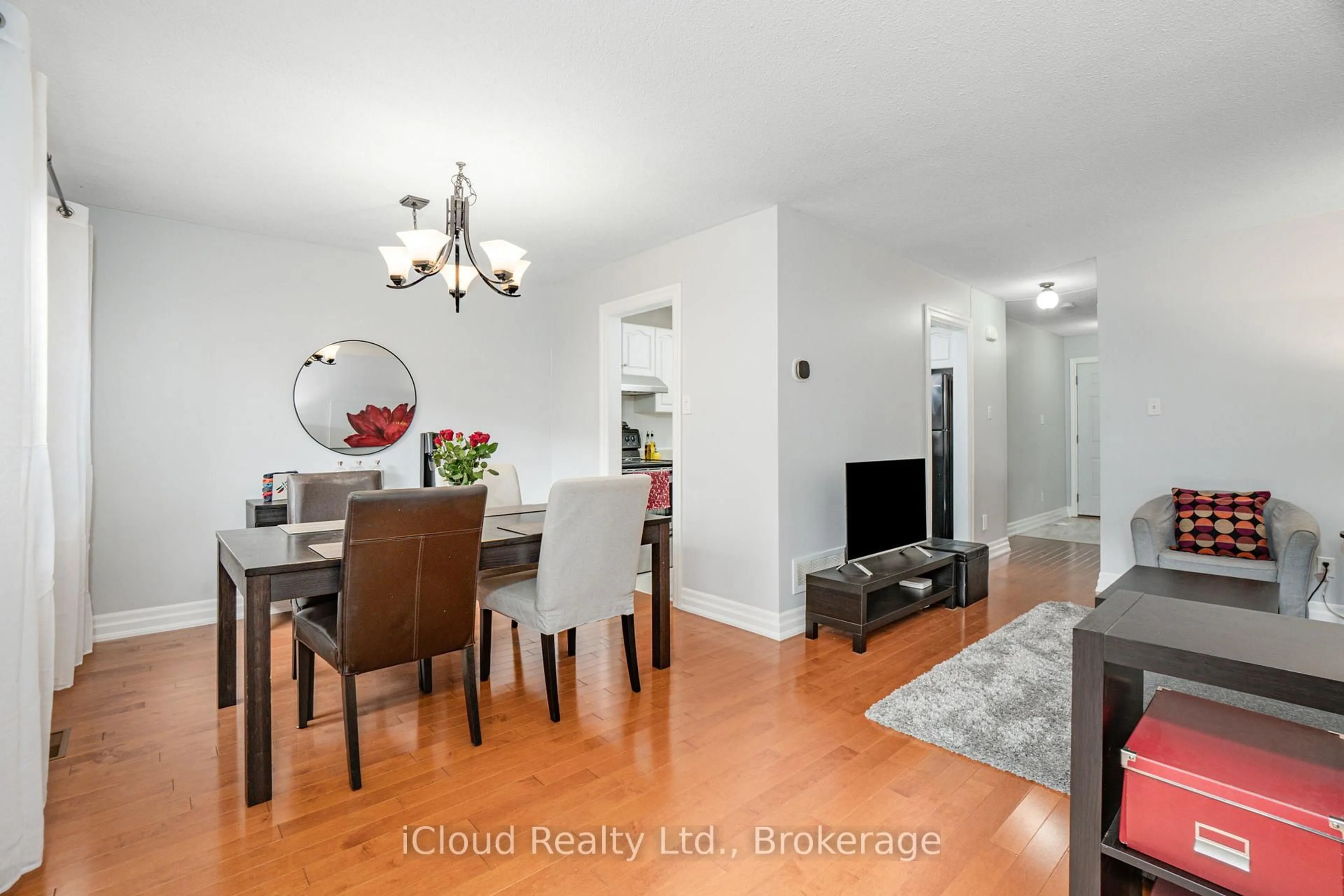 Dining room, wood/laminate floor for 5061 Pinedale Ave #101, Burlington Ontario L7L 5J6