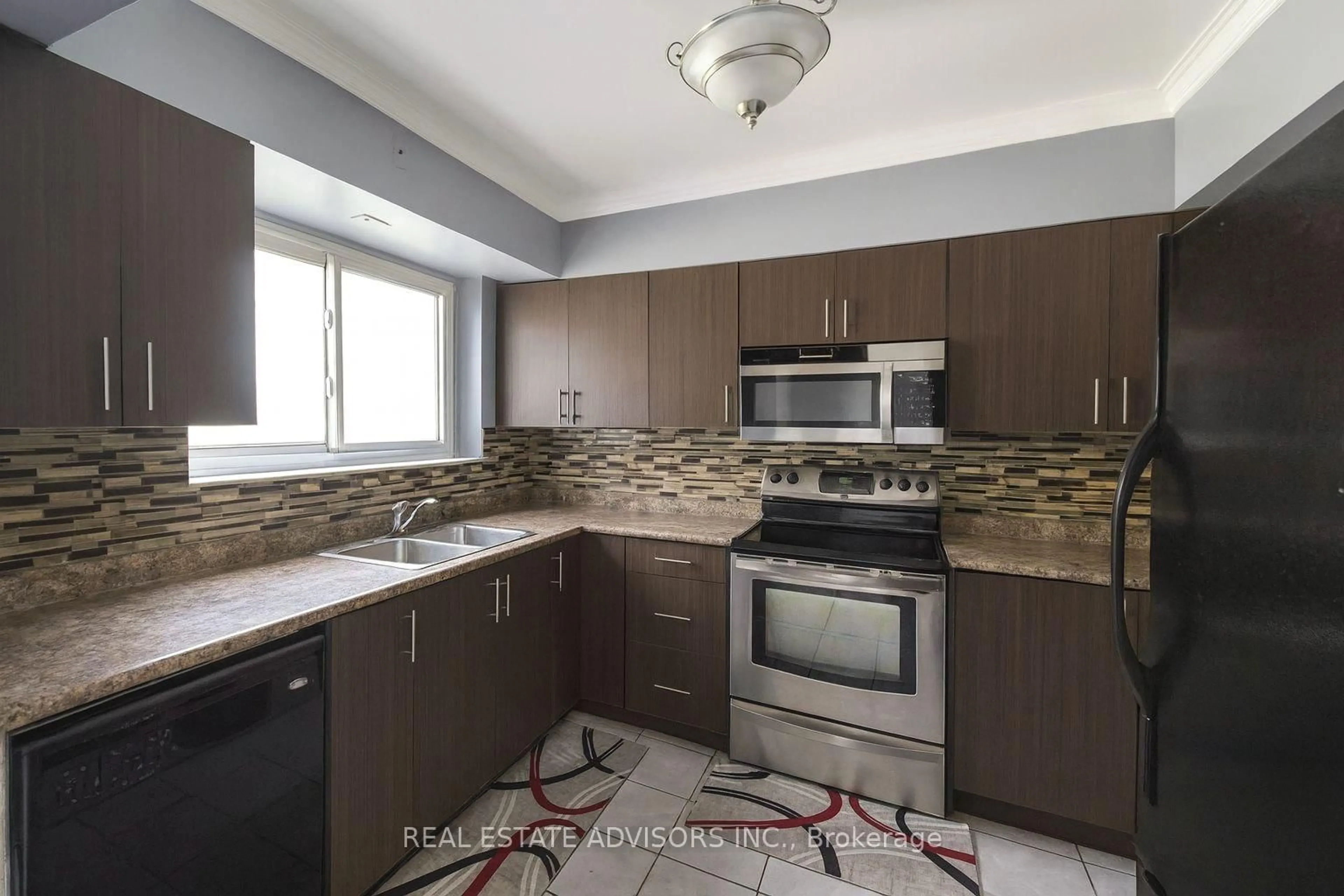Standard kitchen, ceramic/tile floor for 65 Moncrieff Dr, Toronto Ontario M9W 2R3