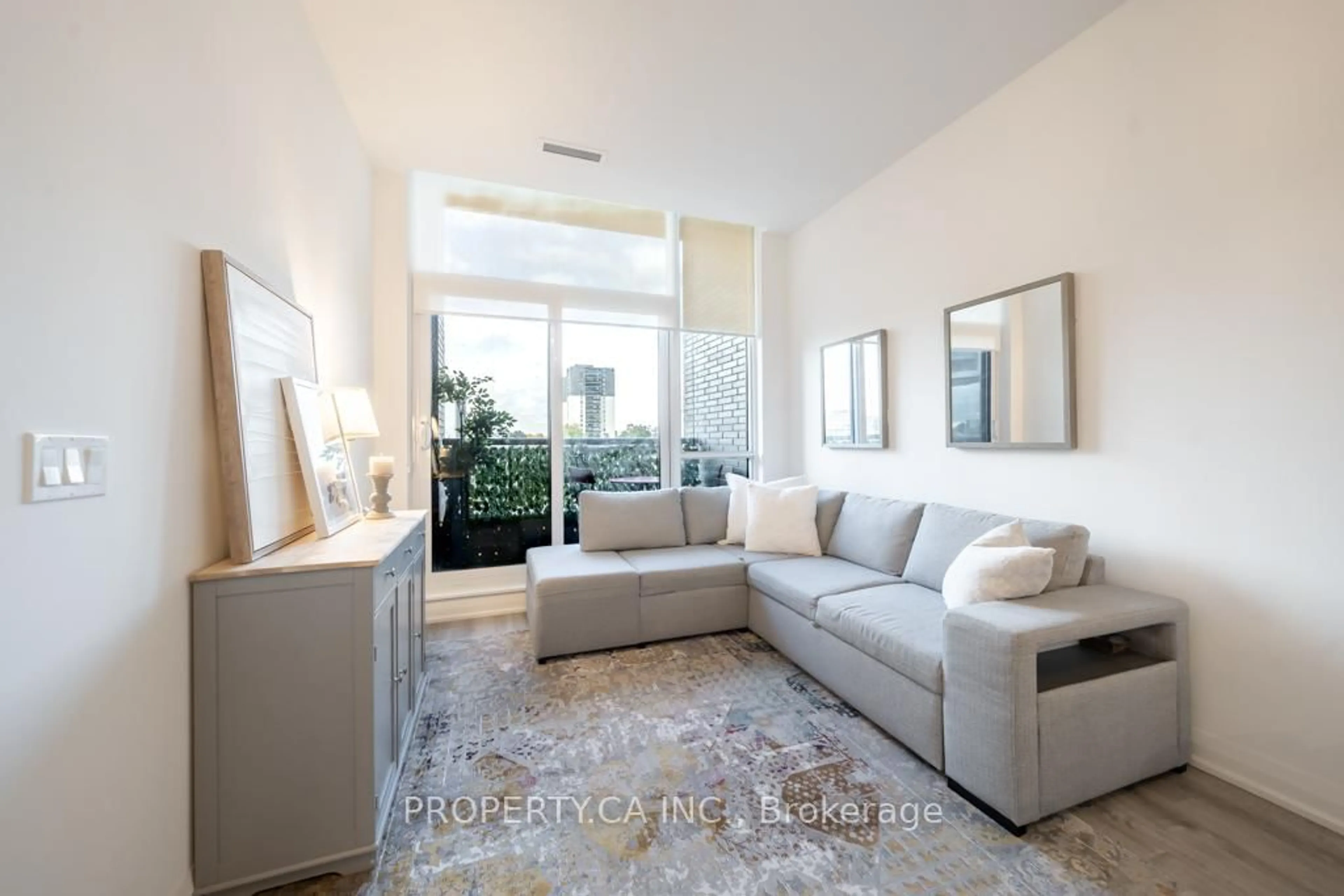 Living room with furniture, unknown for 10 Gibbs Rd #304, Toronto Ontario M9B 0E2