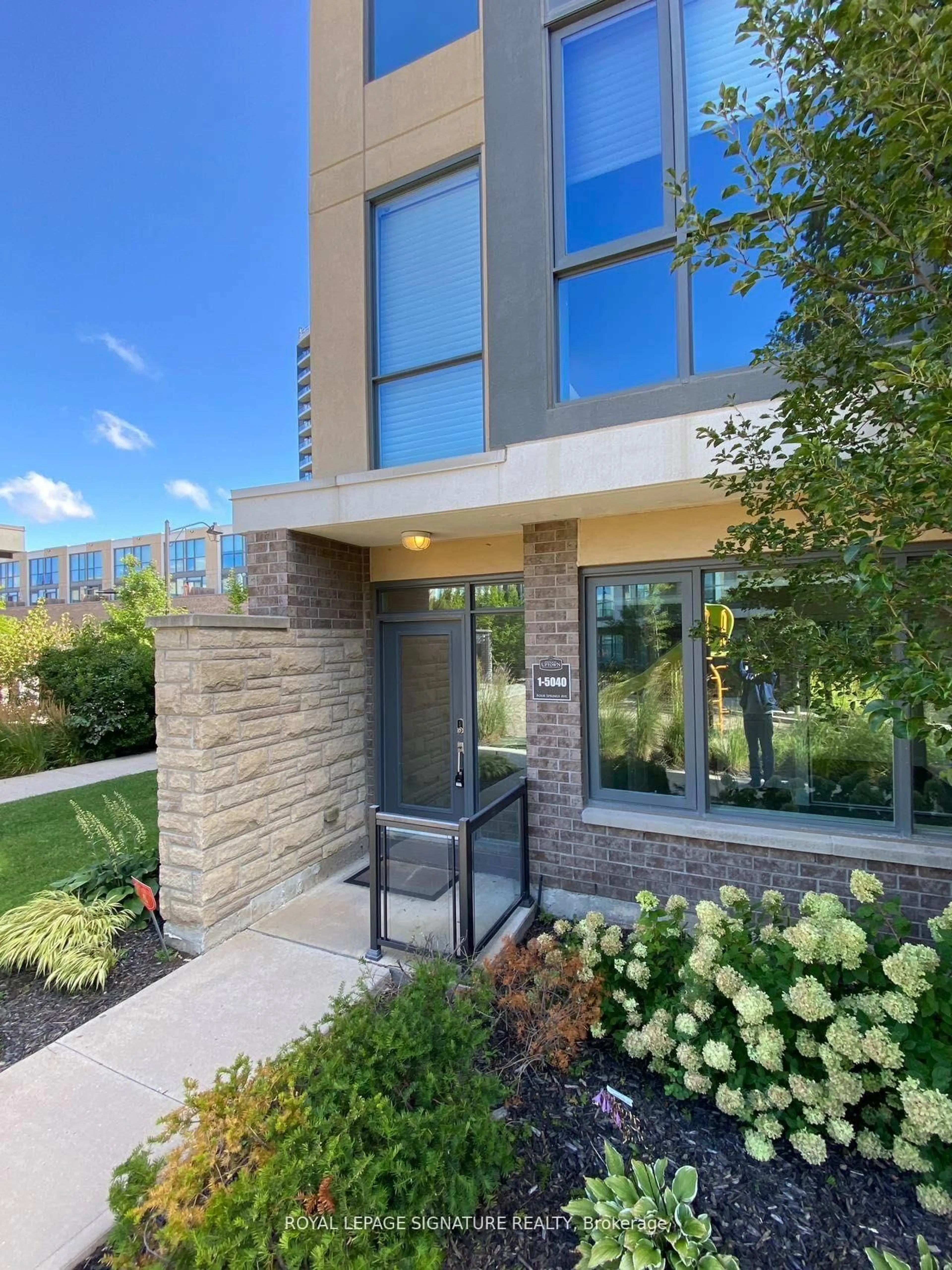 Home with brick exterior material, street for 5040 Four Springs Ave #1, Mississauga Ontario L5R 0E9