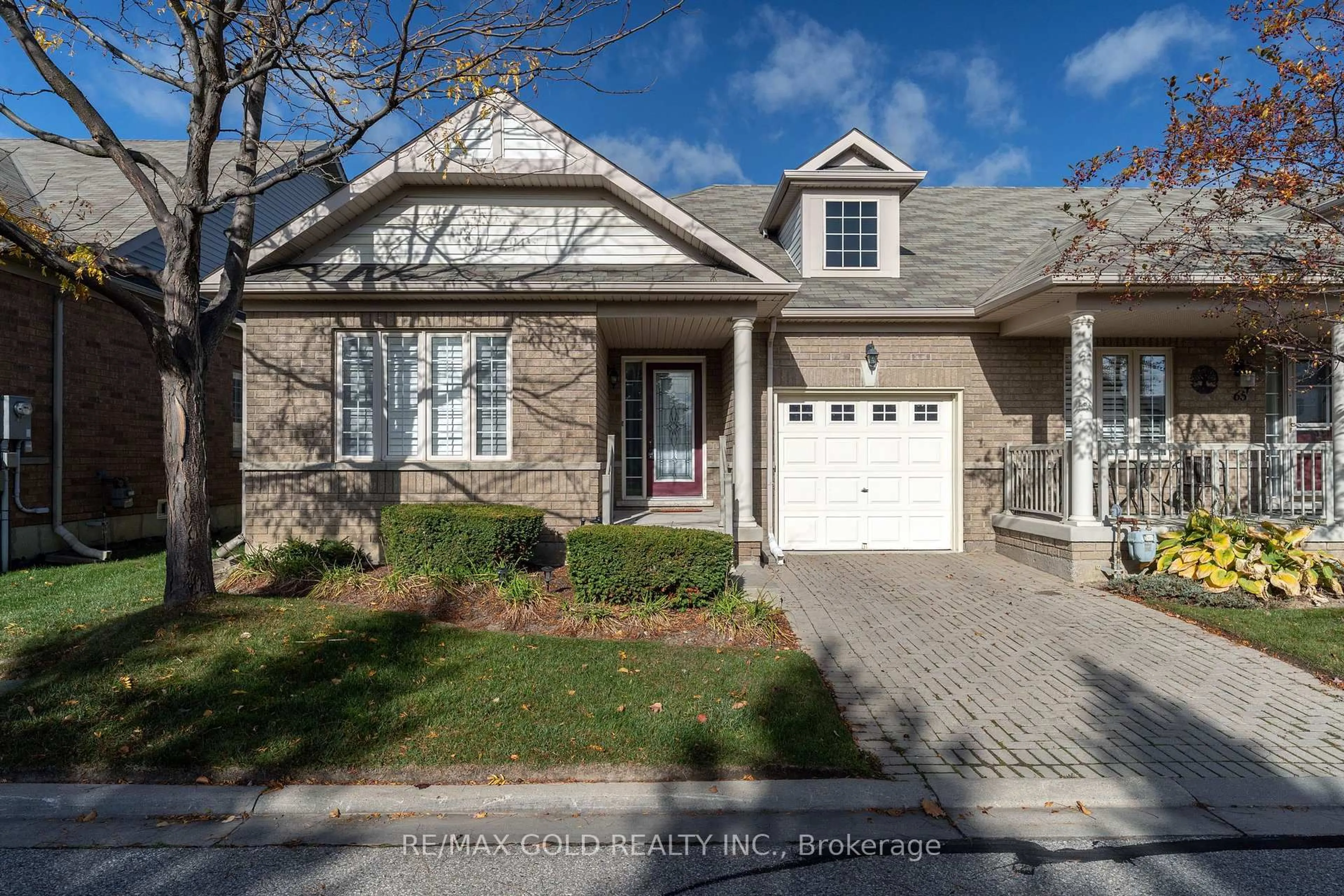 Home with brick exterior material, street for 67 Locust Dr, Brampton Ontario L6R 0W2