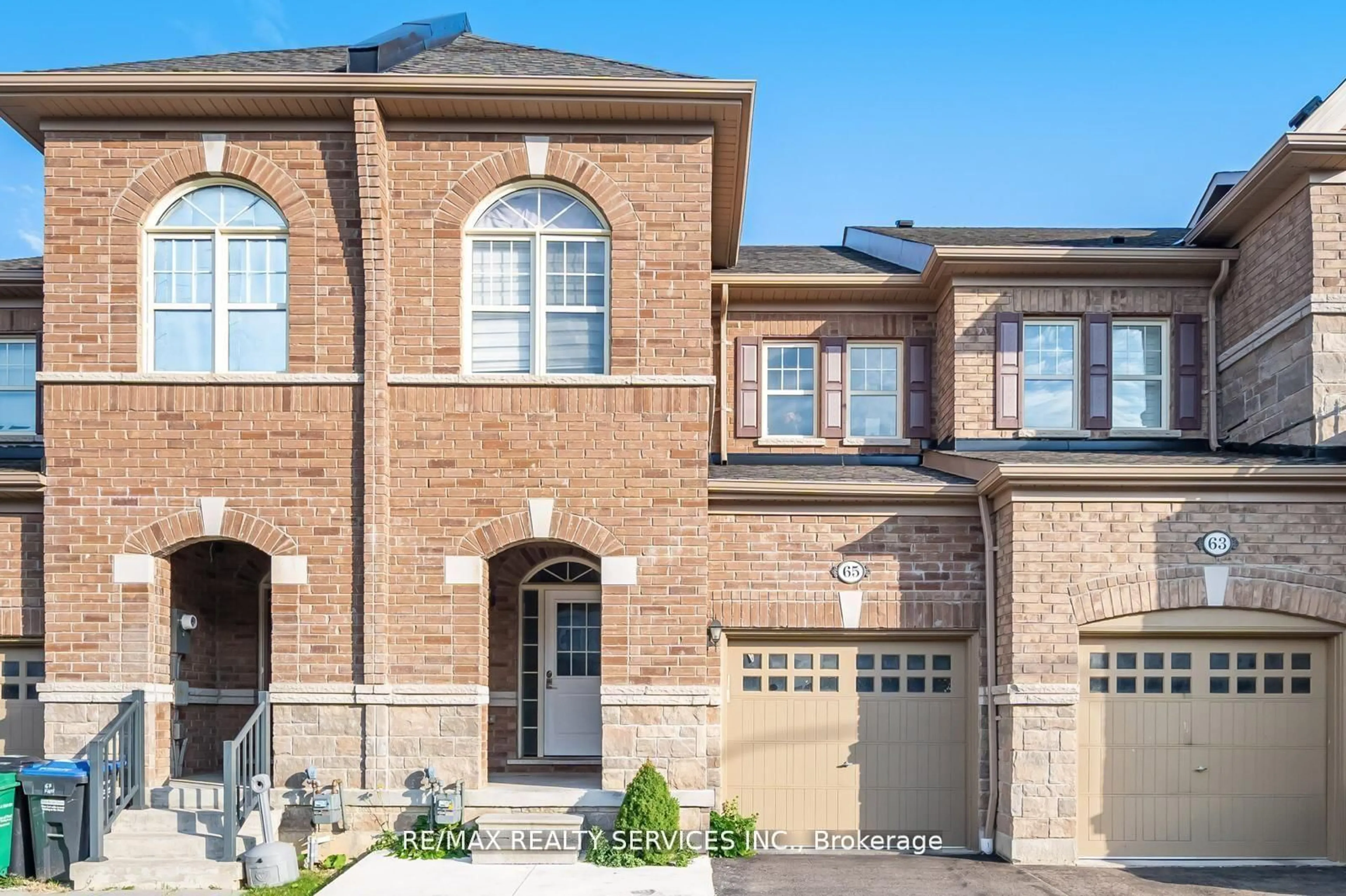 Home with brick exterior material, street for 65 Fann Dr, Brampton Ontario L7A 4L3