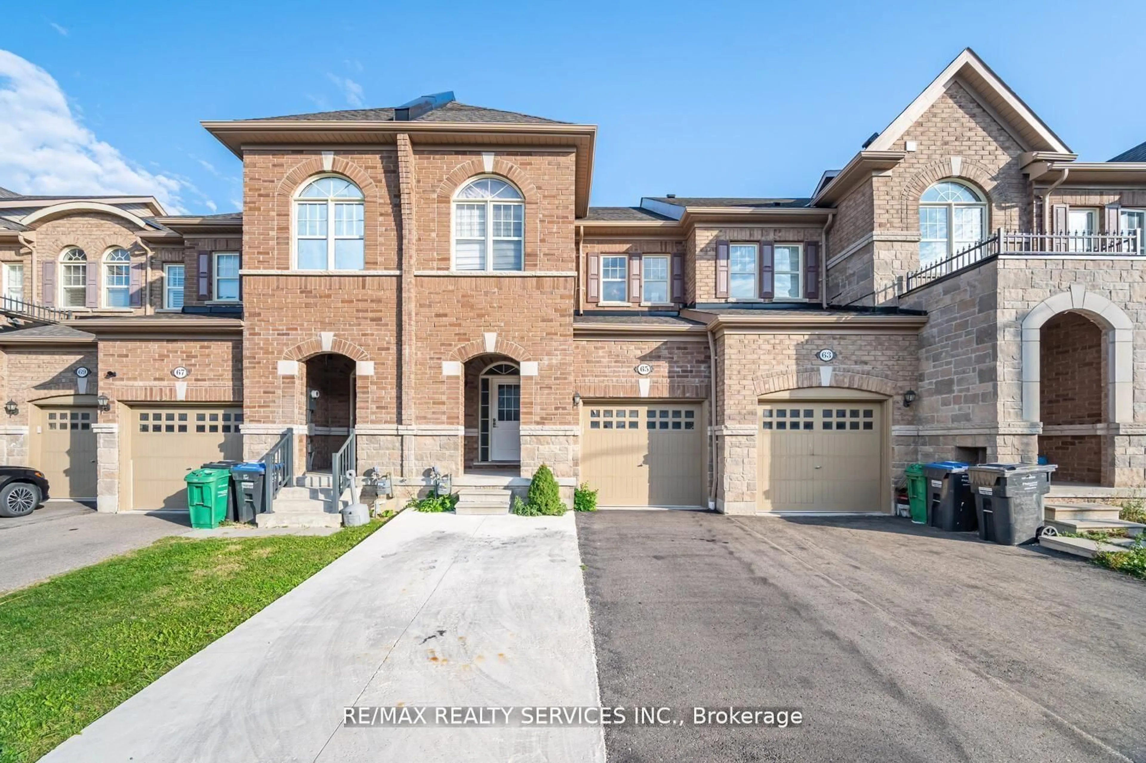 Home with brick exterior material, street for 65 Fann Dr, Brampton Ontario L7A 4L3