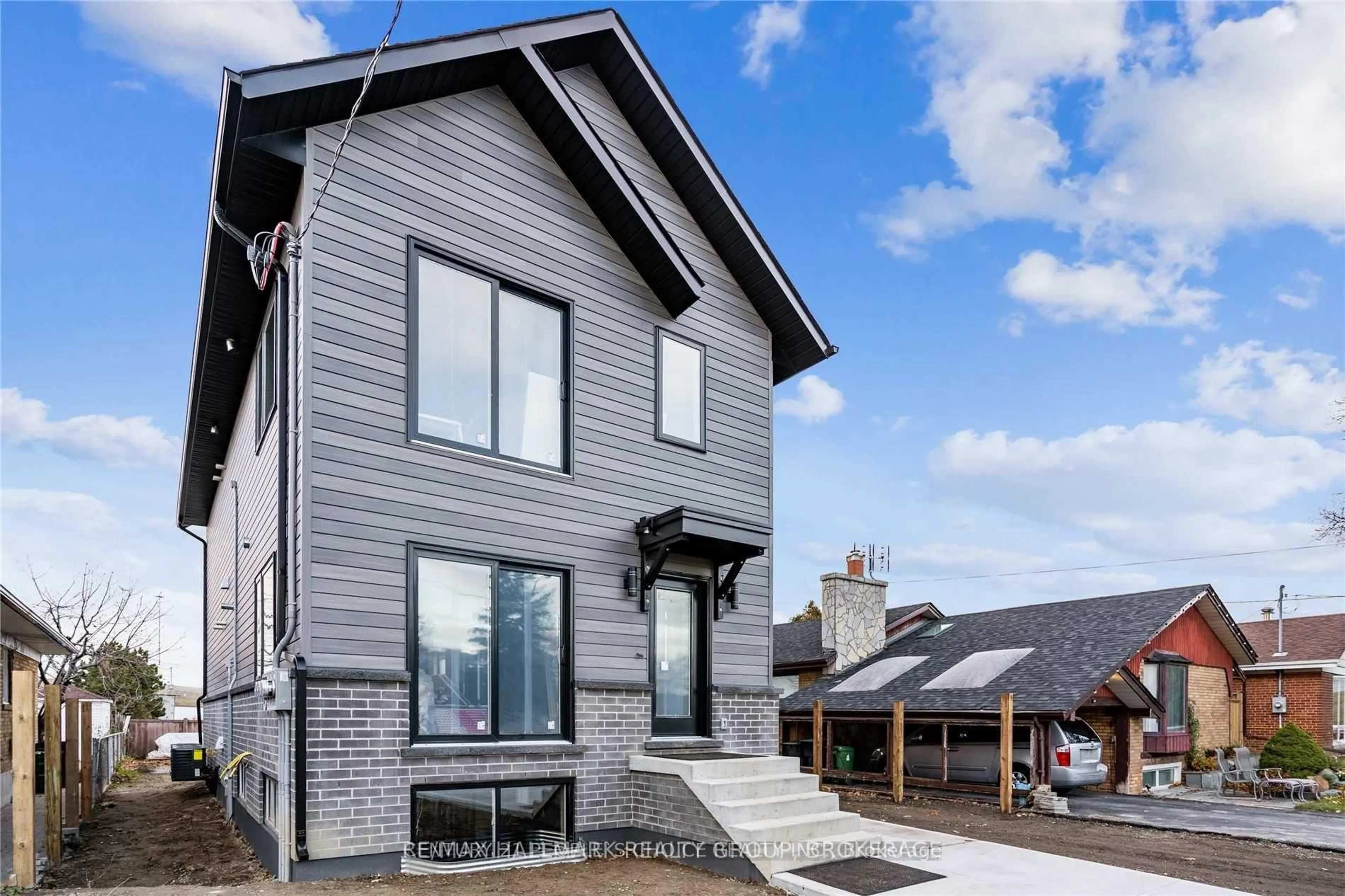 Home with brick exterior material, street for 54 Westhampton Dr, Toronto Ontario M9R 1X6