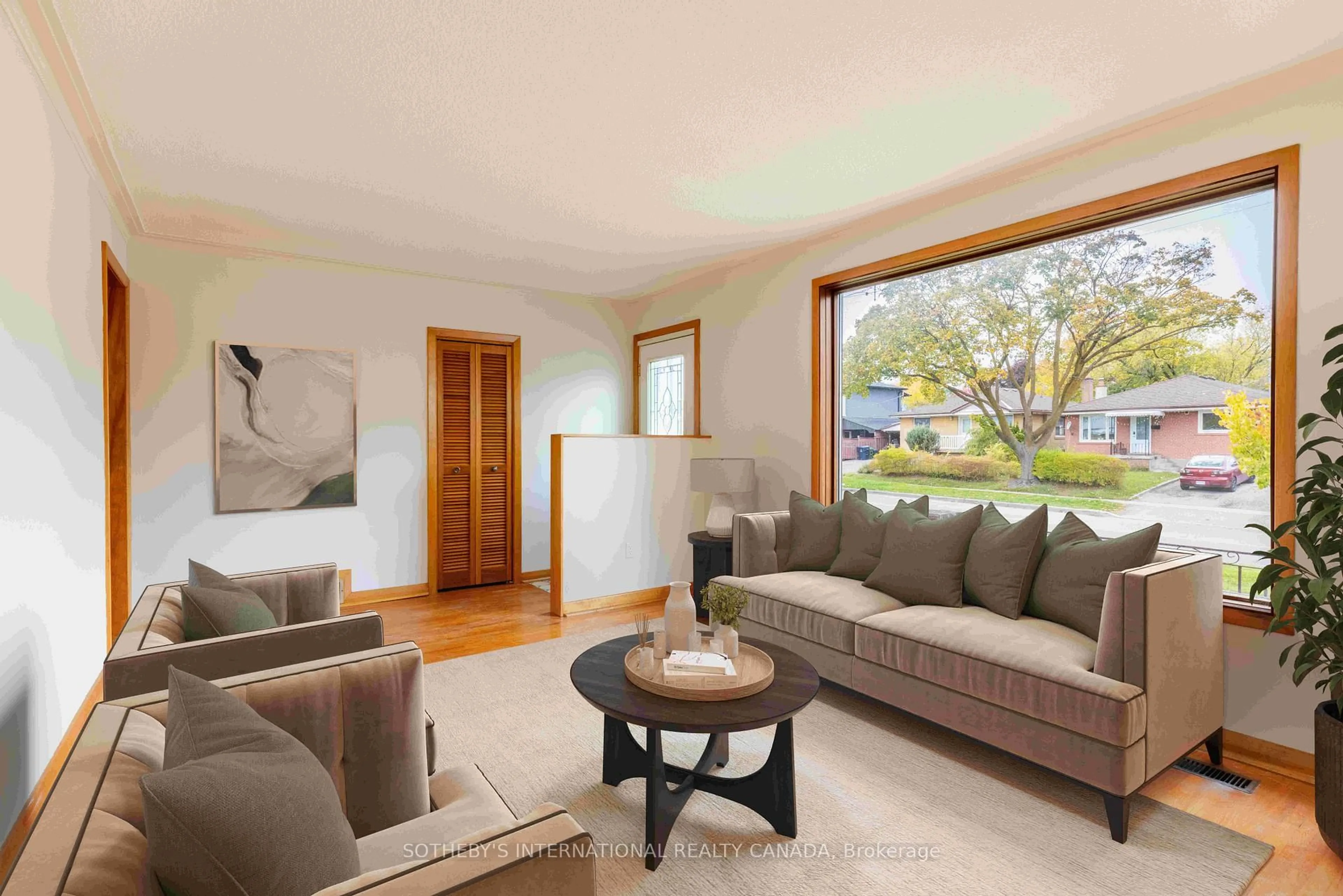 Living room with furniture, wood/laminate floor for 123 Redwater Dr, Toronto Ontario M9W 2A3