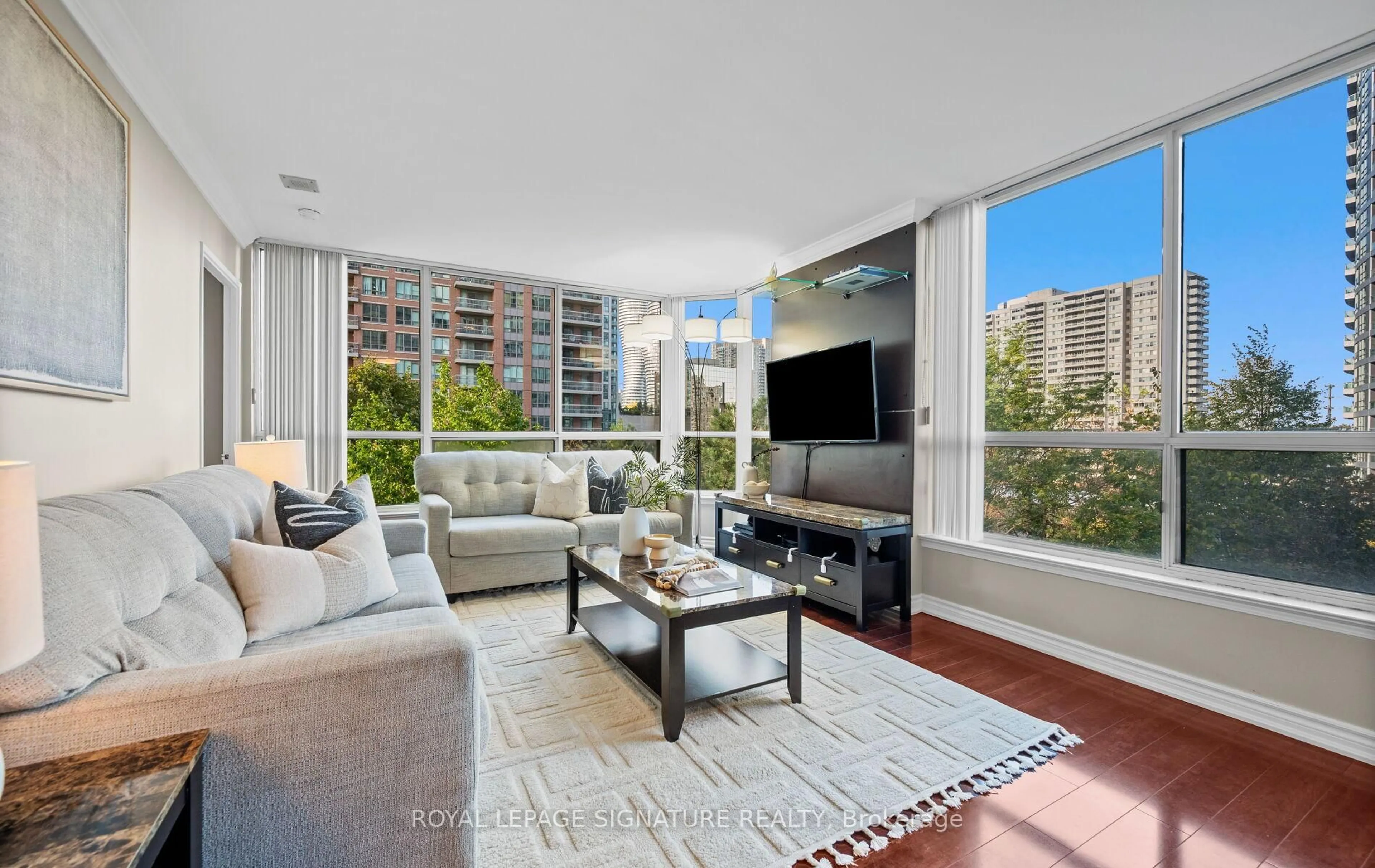 Living room with furniture, unknown for 55 Elm Dr #405, Mississauga Ontario L5B 3Z3