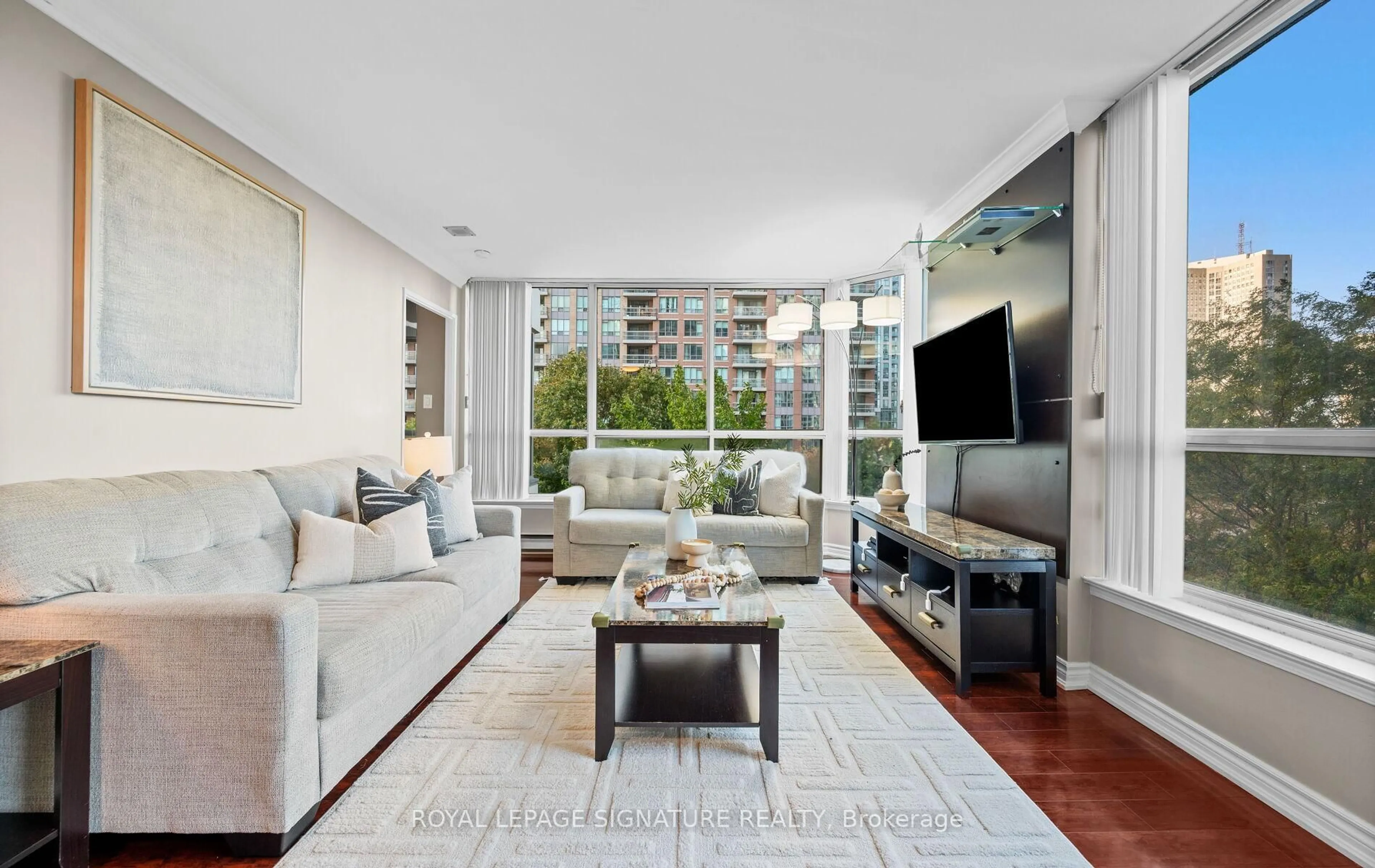 Living room with furniture, unknown for 55 Elm Dr #405, Mississauga Ontario L5B 3Z3