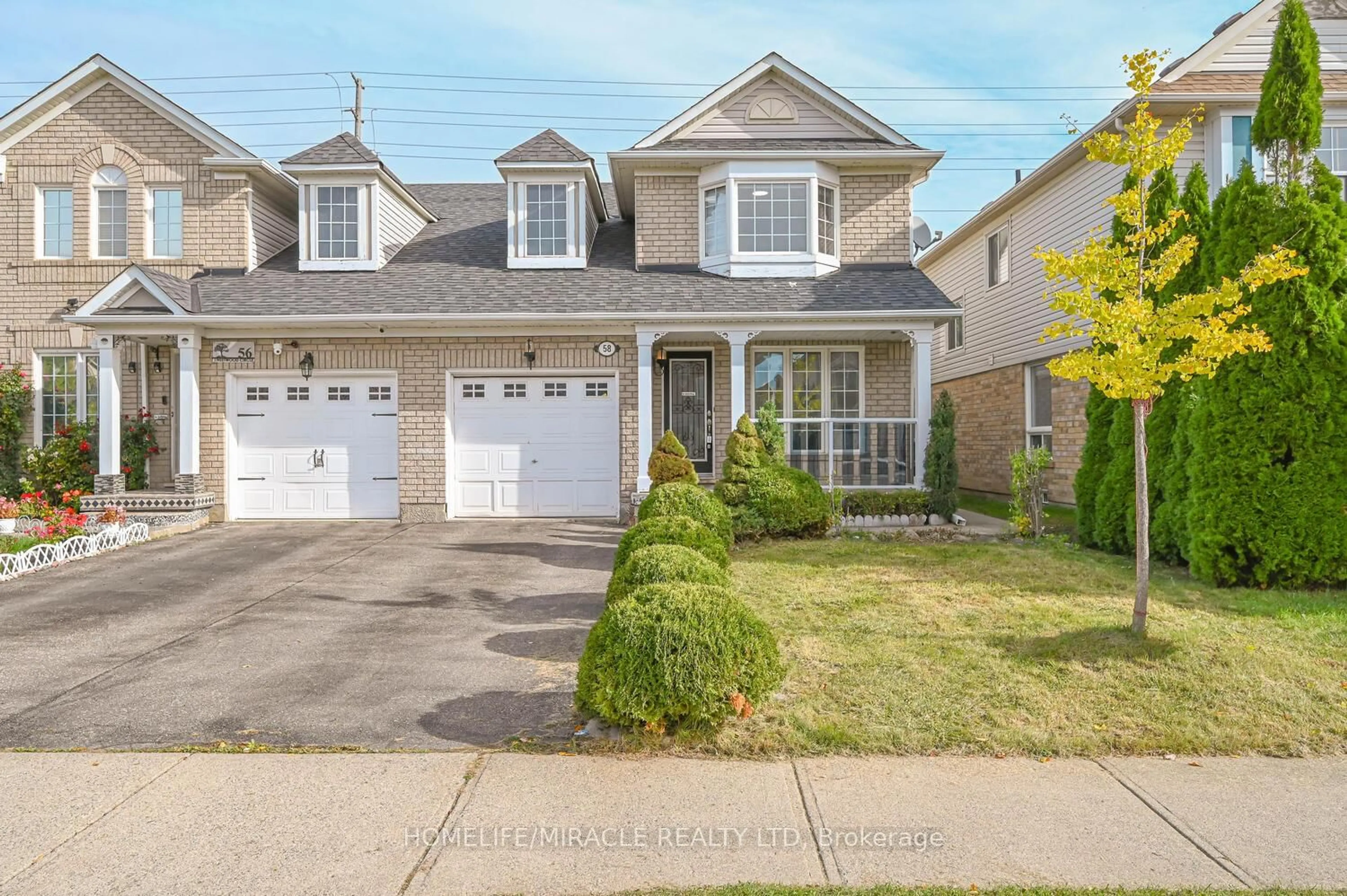 Home with vinyl exterior material, street for 58 Sweetwood Circ, Brampton Ontario L7A 2X7