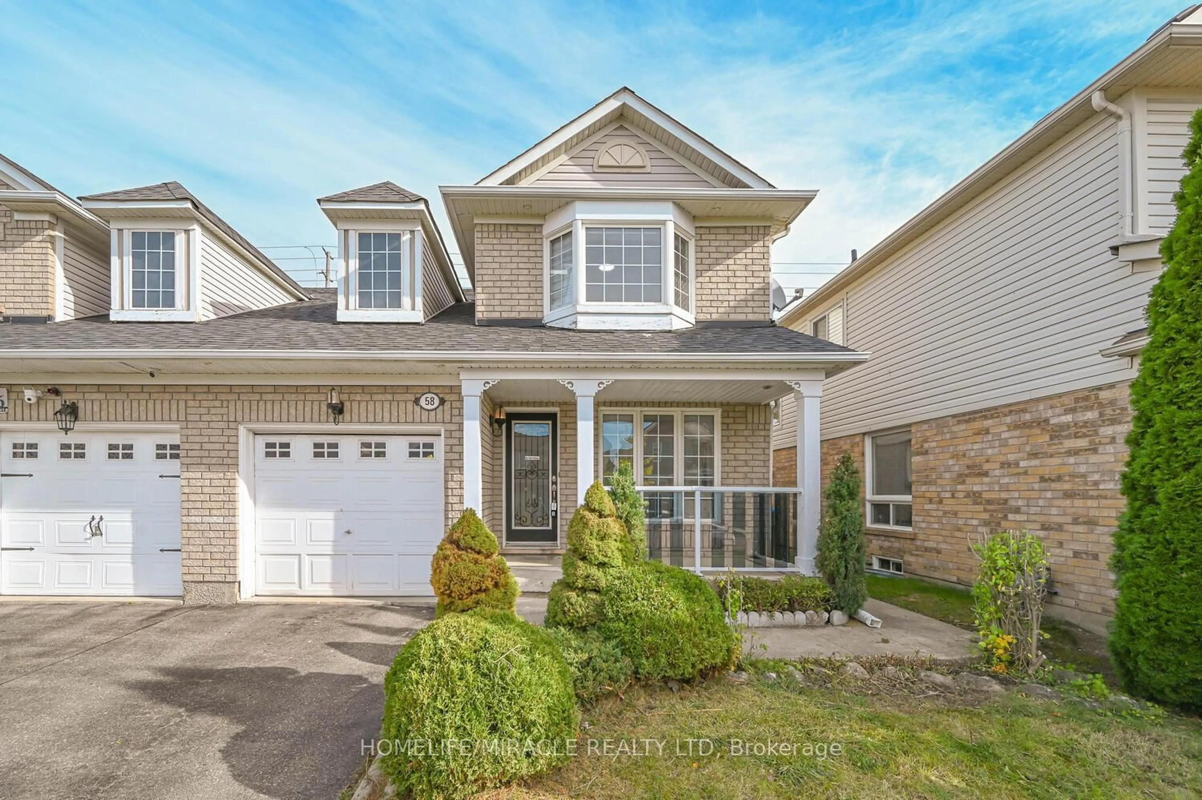 Home with vinyl exterior material, street for 58 Sweetwood Circ, Brampton Ontario L7A 2X7