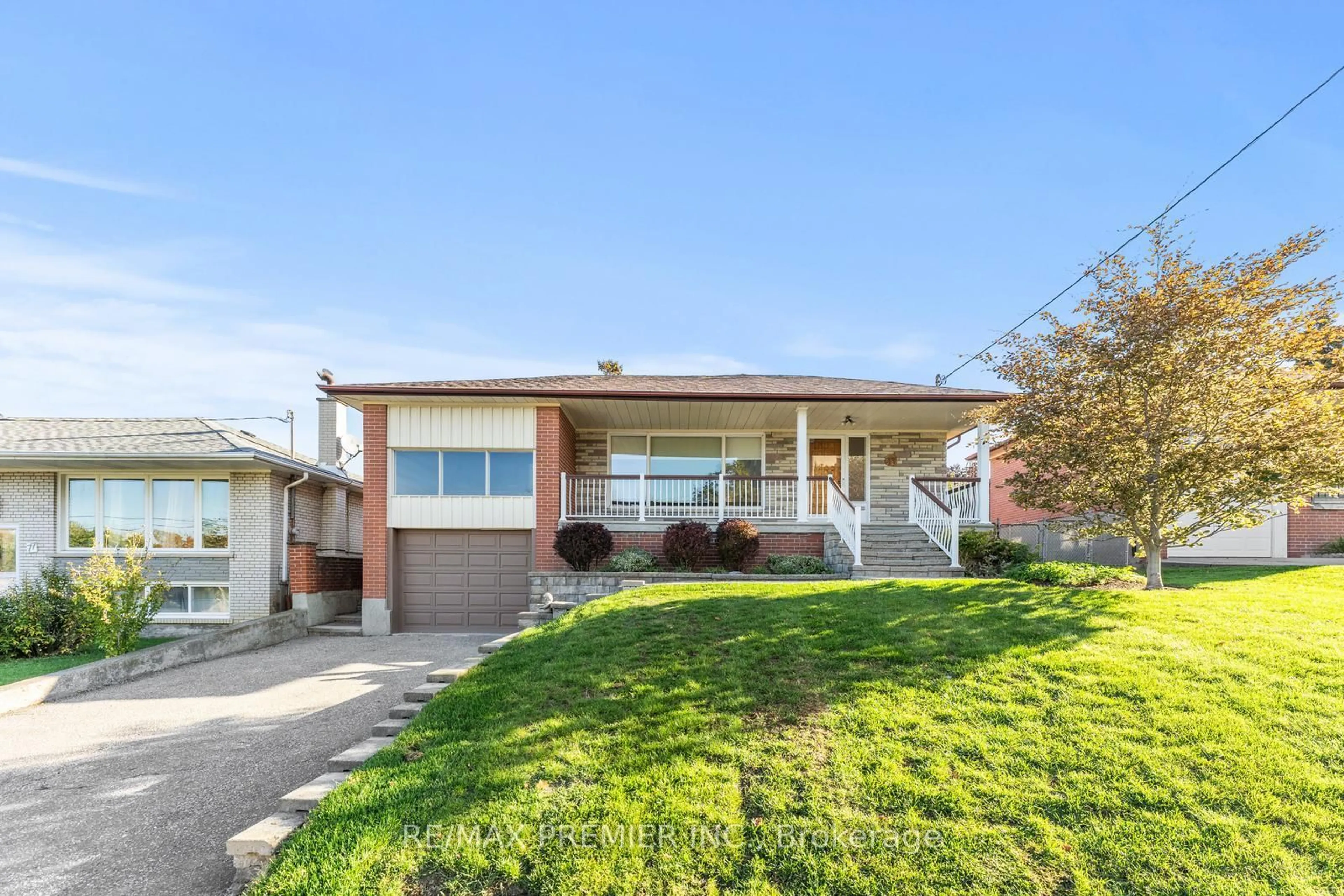 Home with vinyl exterior material, street for 75 Monclova Rd, Toronto Ontario M3M 1N9