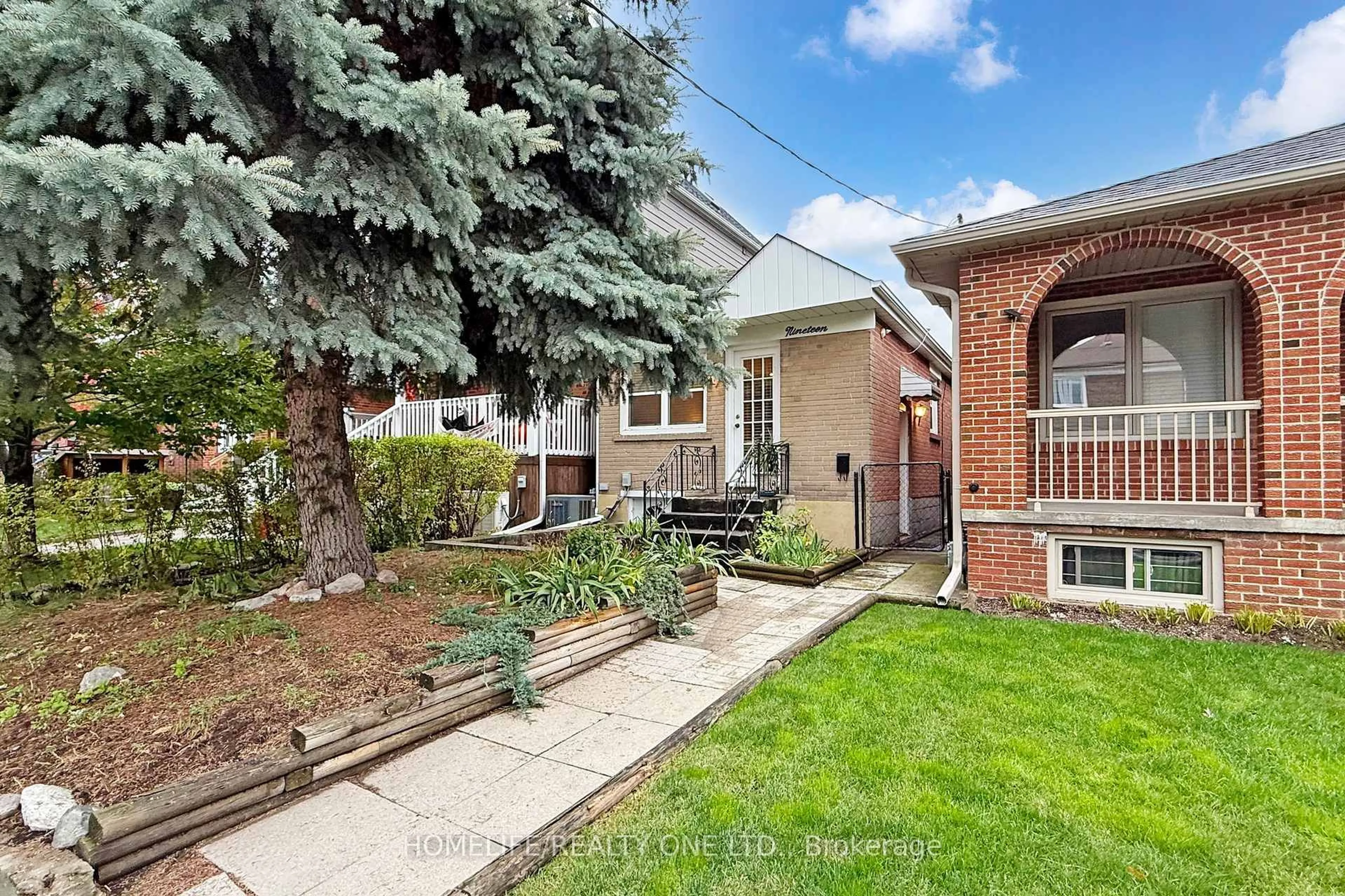 Home with brick exterior material, street for 19 Morland Rd, Toronto Ontario M6S 2M7