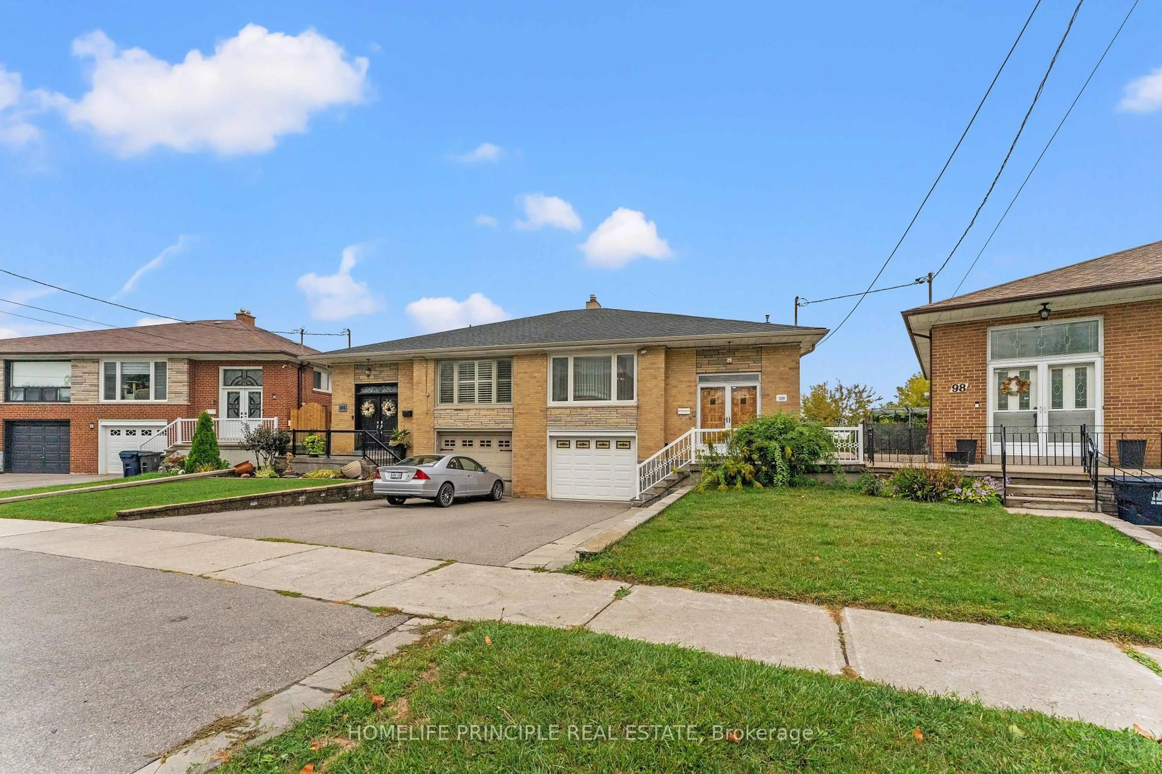 Home with brick exterior material, street for 100 Victory Dr, Toronto Ontario M3M 2J8