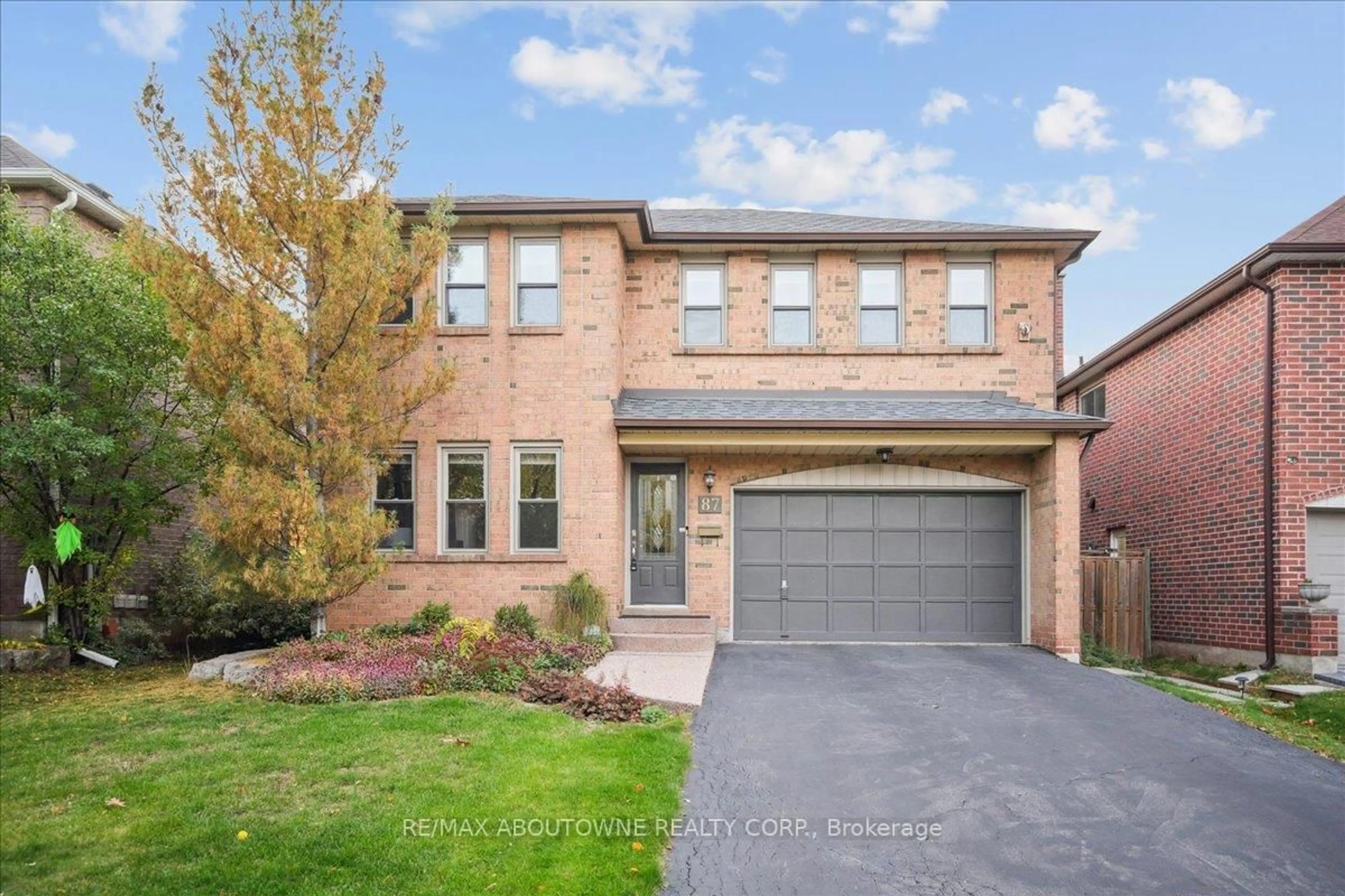 Home with brick exterior material, street for 87 River Oaks Blvd, Oakville Ontario L6H 3N4
