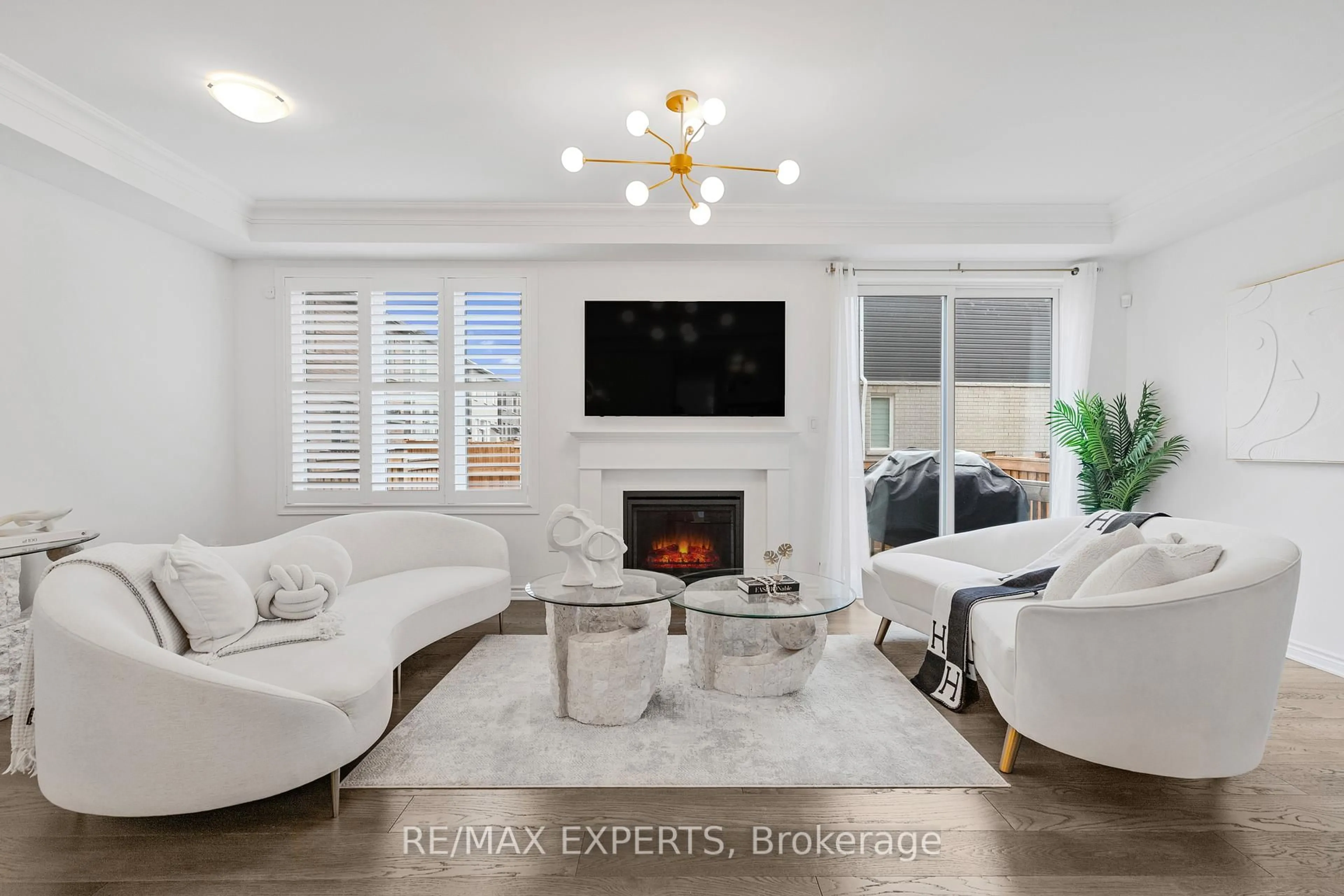 Living room with furniture, ceramic/tile floor for 1358 Lobelia Cres, Milton Ontario L9E 1X5