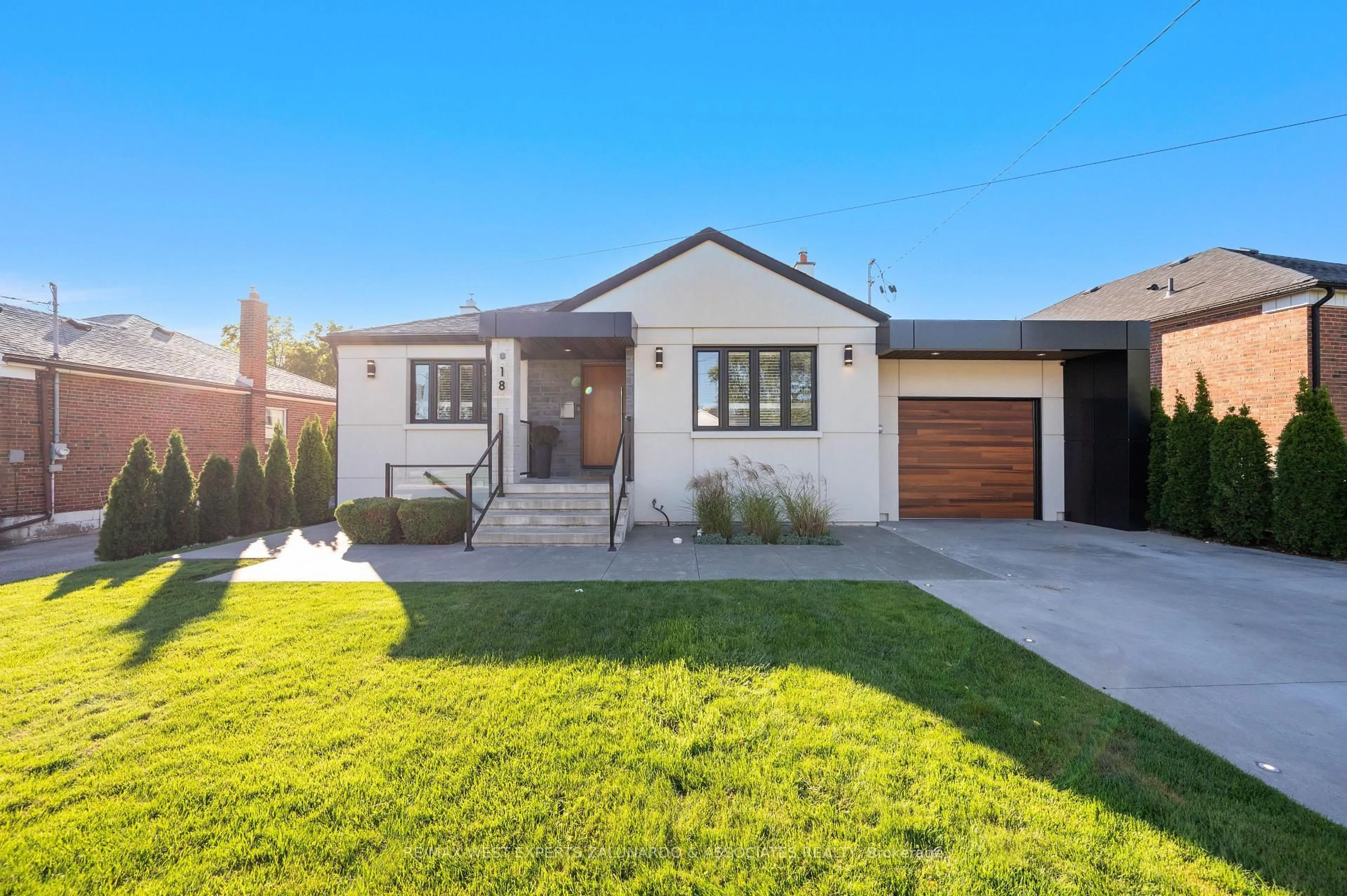 Home with brick exterior material, street for 18 Smallwood Dr, Toronto Ontario M3M 1K8