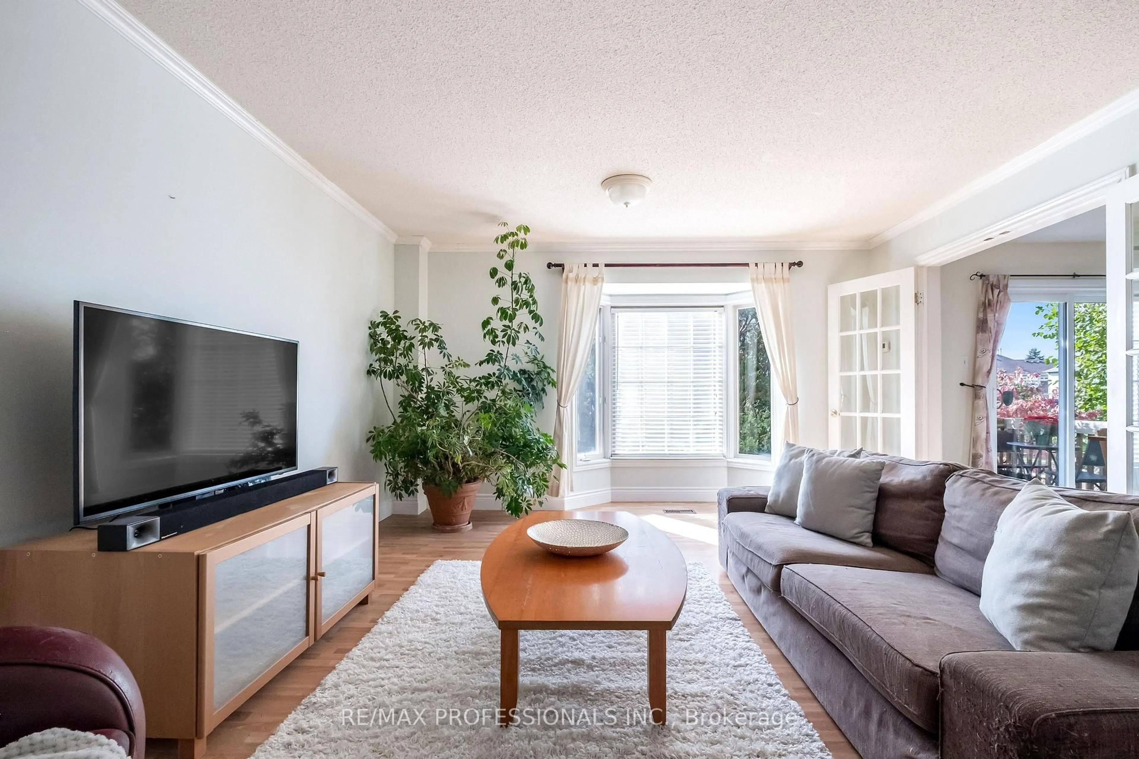 Living room with furniture, unknown for 65 Hickorybush Ave, Brampton Ontario L6R 1C8
