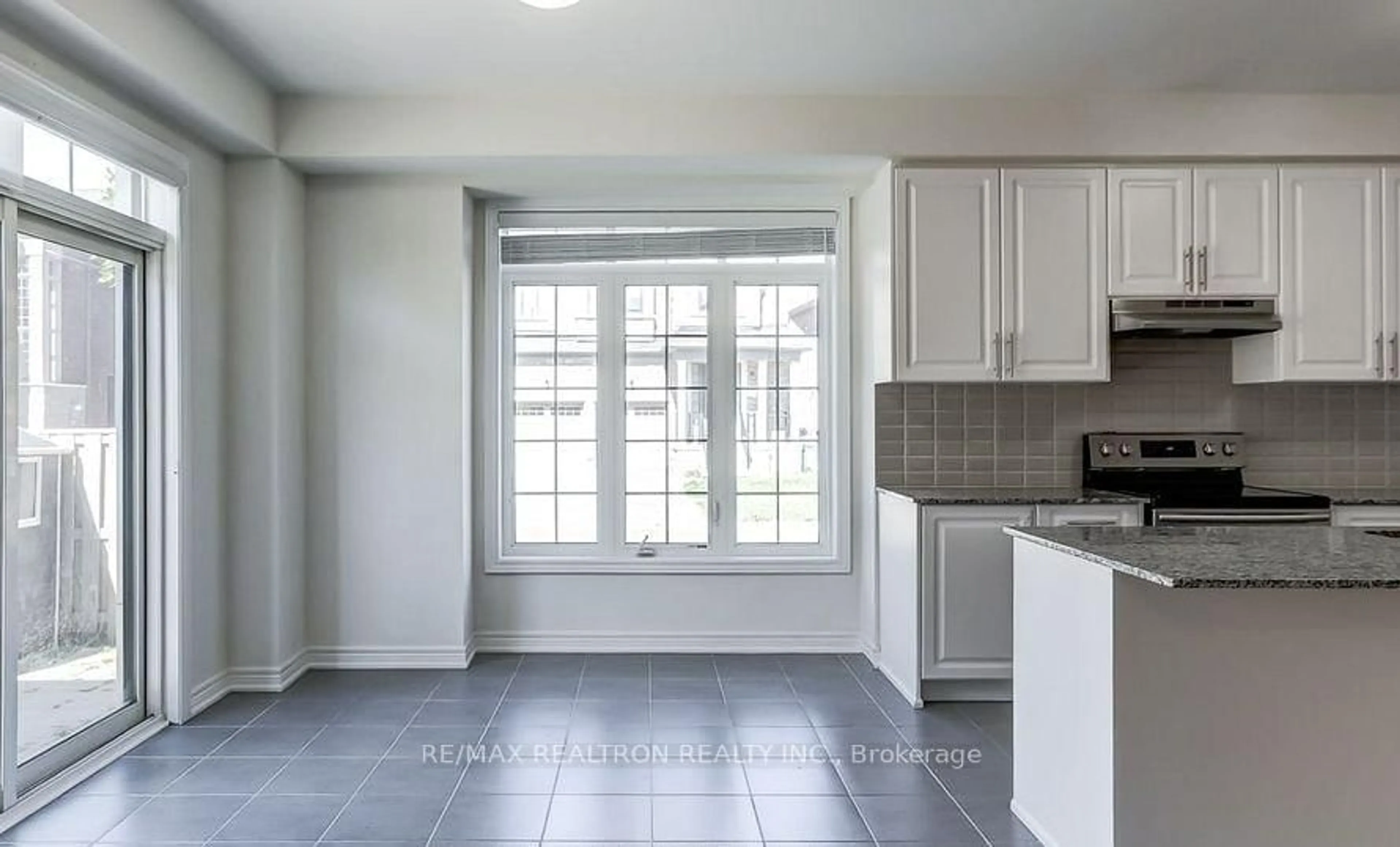 Open concept kitchen, ceramic/tile floor for 44 Brent Stephens Way, Brampton Ontario L7A 0C3