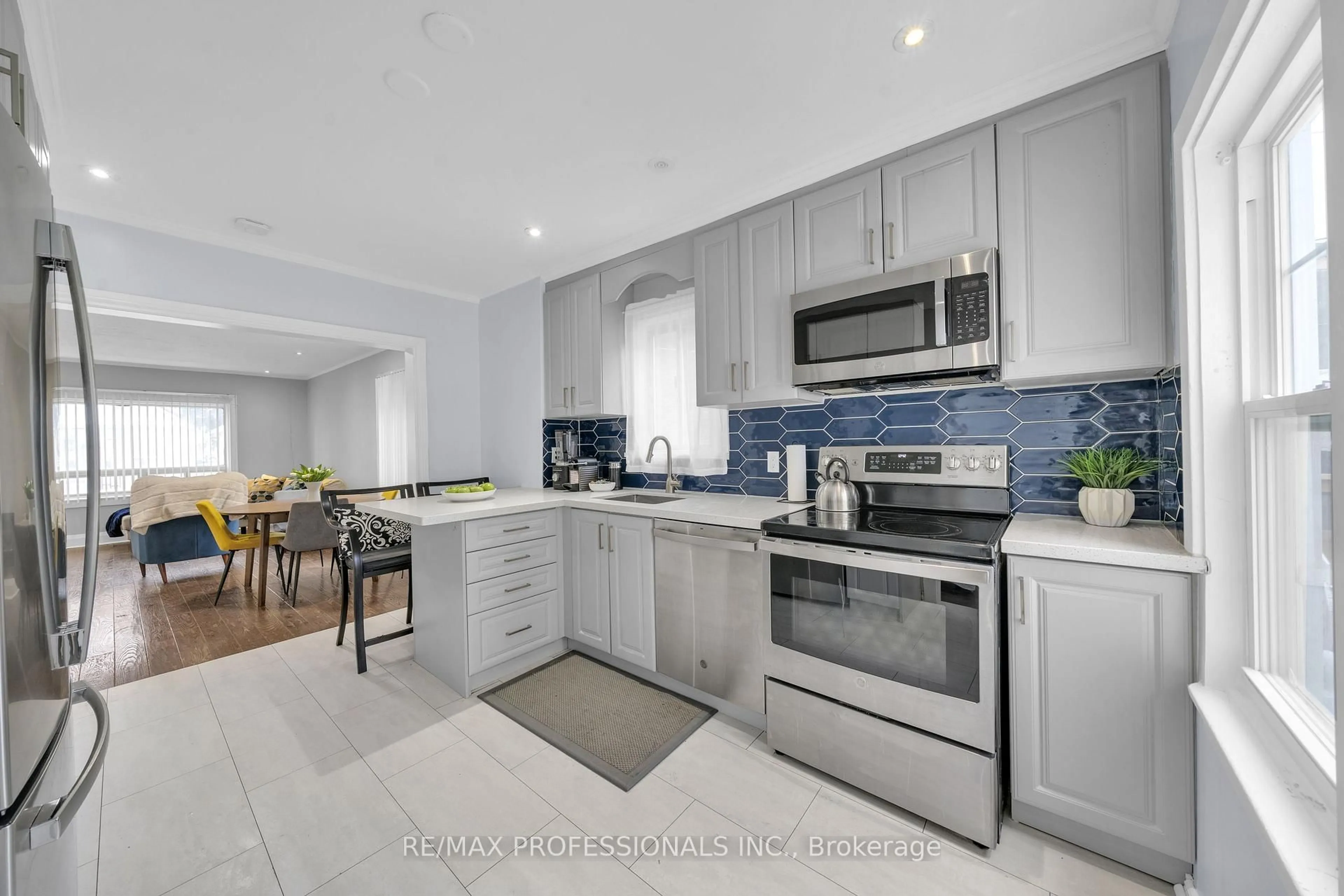 Open concept kitchen, ceramic/tile floor for 38 Nickle St, Toronto Ontario M6M 2H6