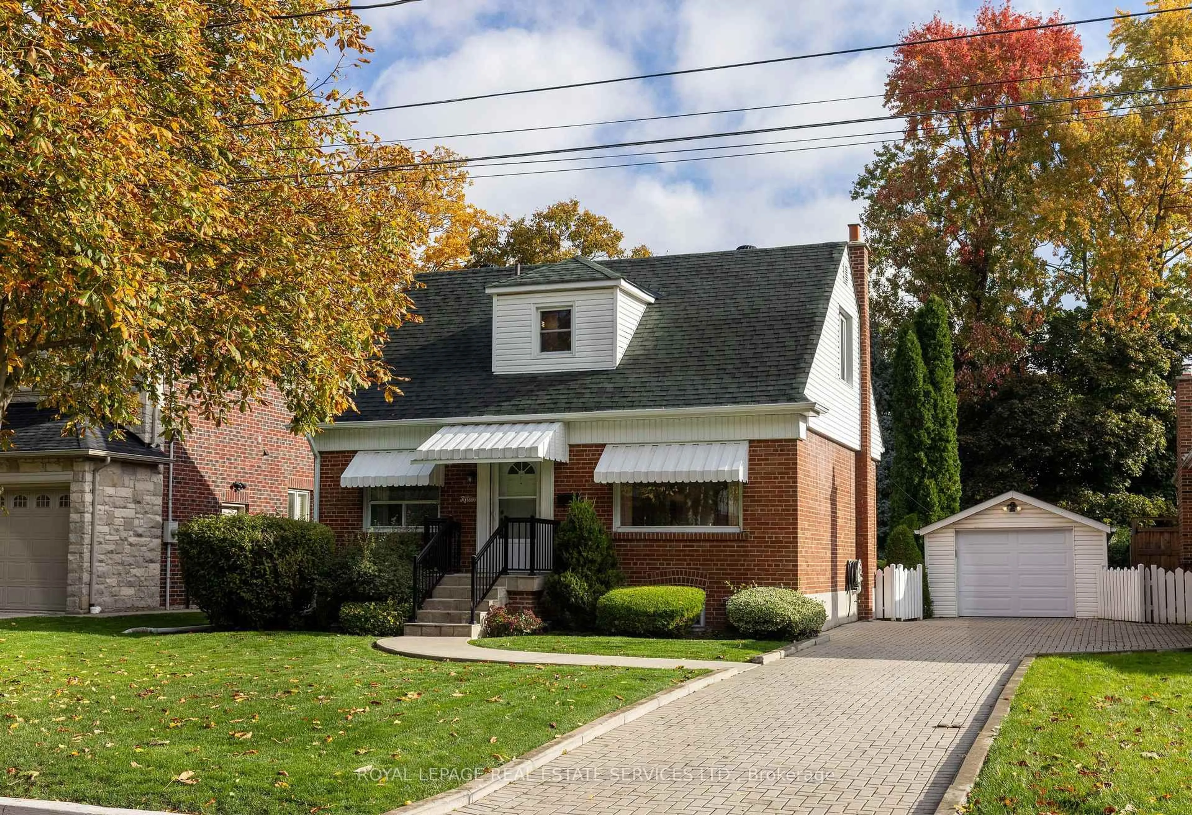 Home with brick exterior material, street for 15 Burnelm Dr, Toronto Ontario M9B 4N2