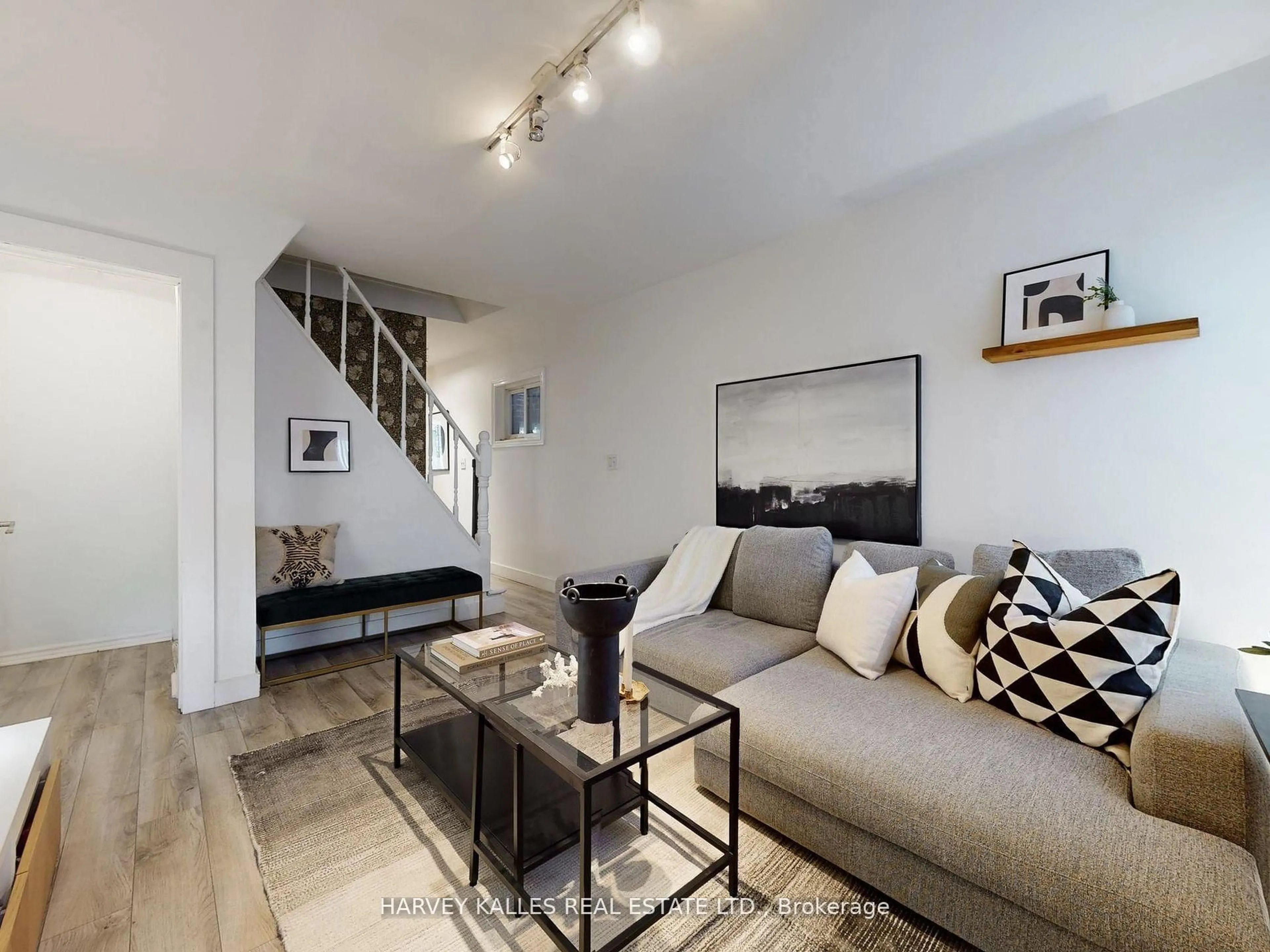 Living room with furniture, unknown for 211 Rosemount Ave, Toronto Ontario M6H 2N2