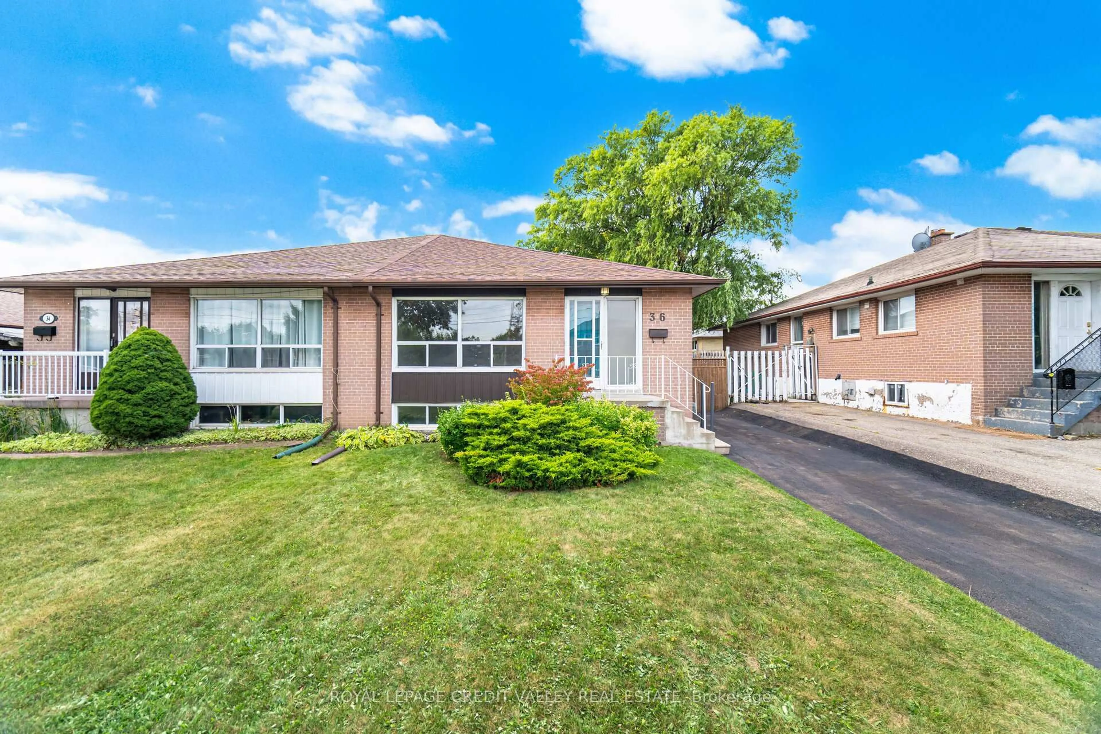 Home with vinyl exterior material, street for 36 Autumn Blvd, Brampton Ontario L6T 2V9