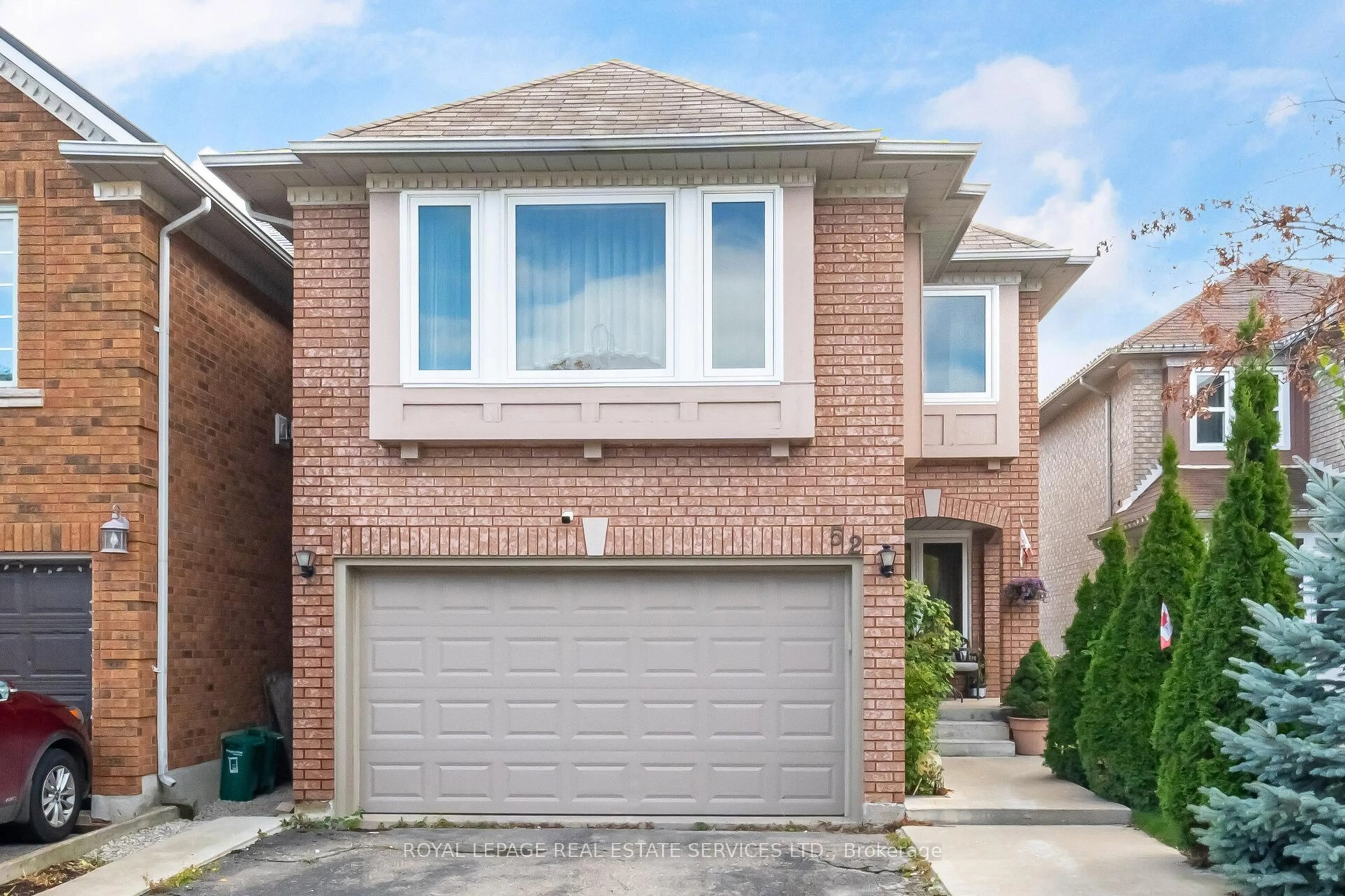 Home with brick exterior material, street for 52 Wildberry Cres, Brampton Ontario L6R 1J9