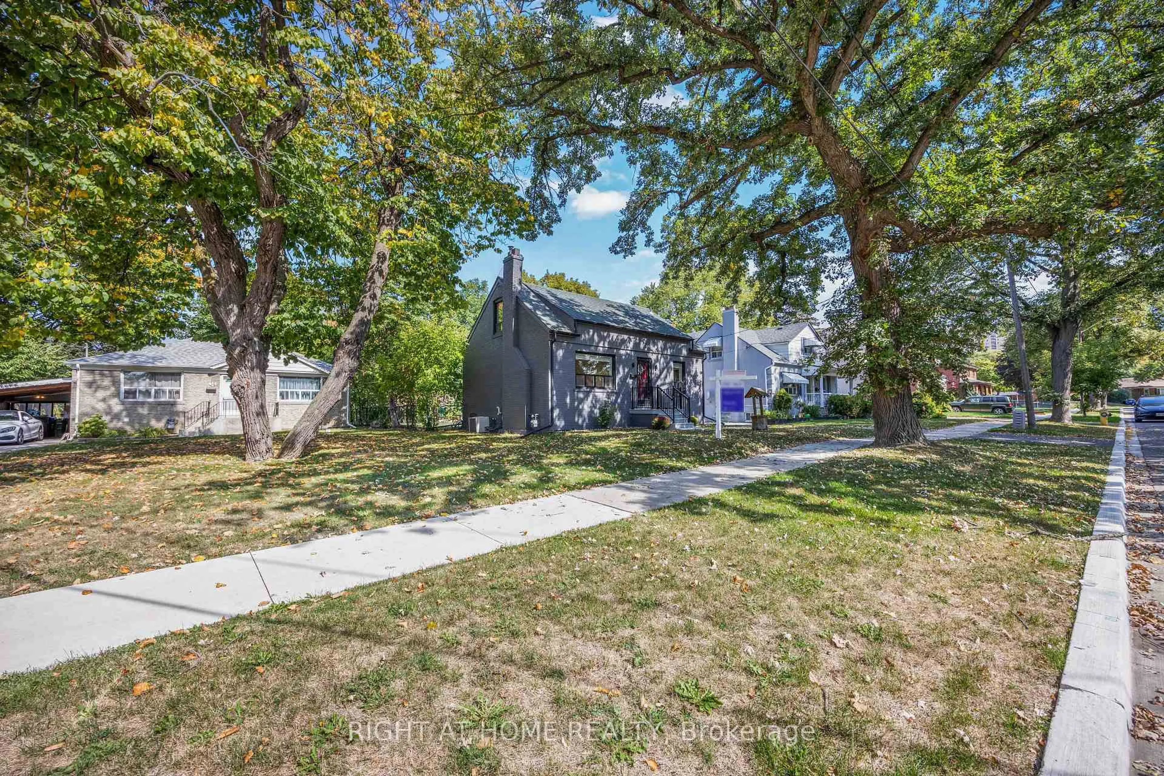 A pic from outside/outdoor area/front of a property/back of a property/a pic from drone, street for 12 Rosalie Ave, Toronto Ontario M3L 1C5