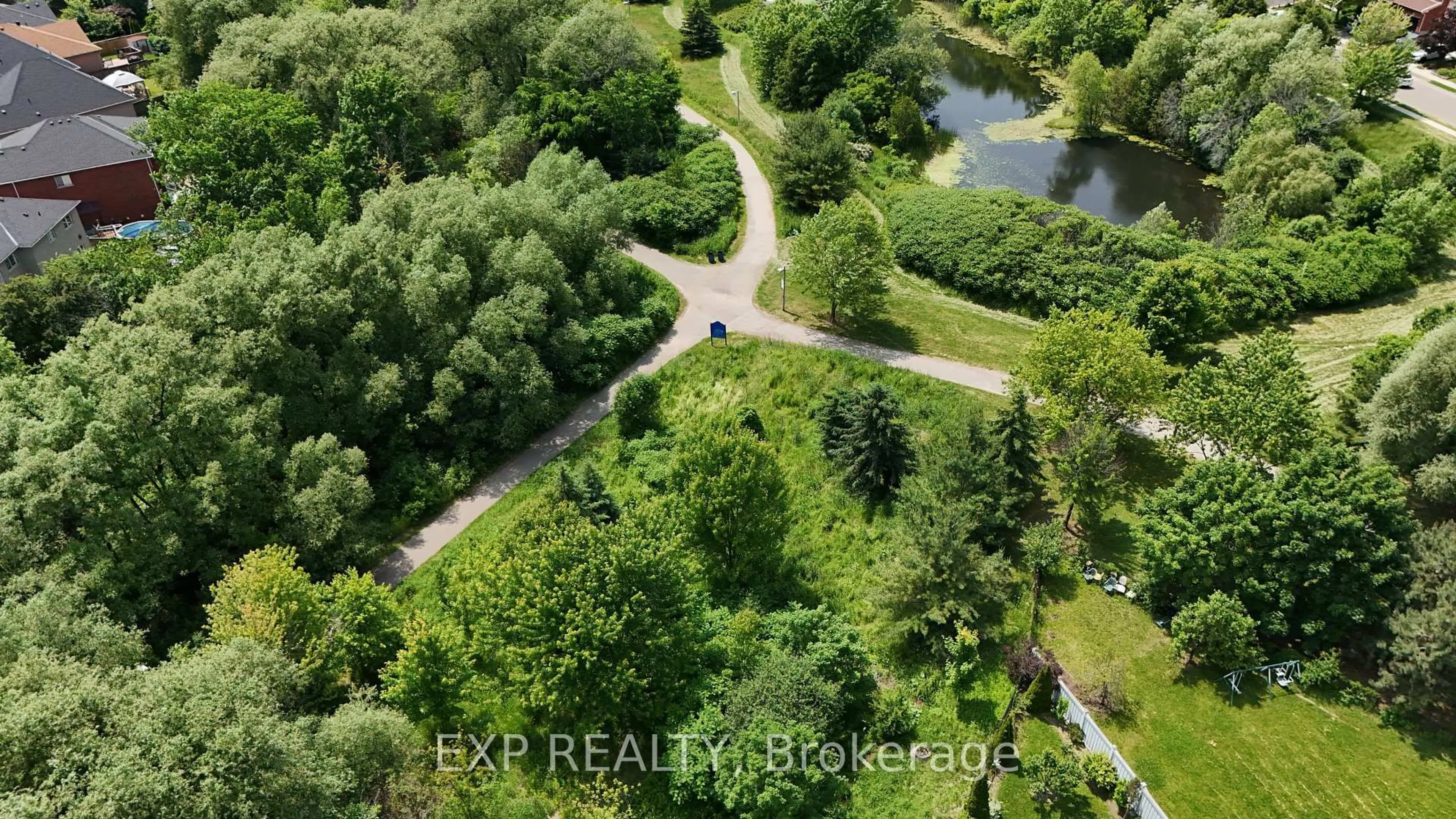 A pic from outside/outdoor area/front of a property/back of a property/a pic from drone, forest/trees view for 100 Dells Cres, Brampton Ontario L7A 2X1