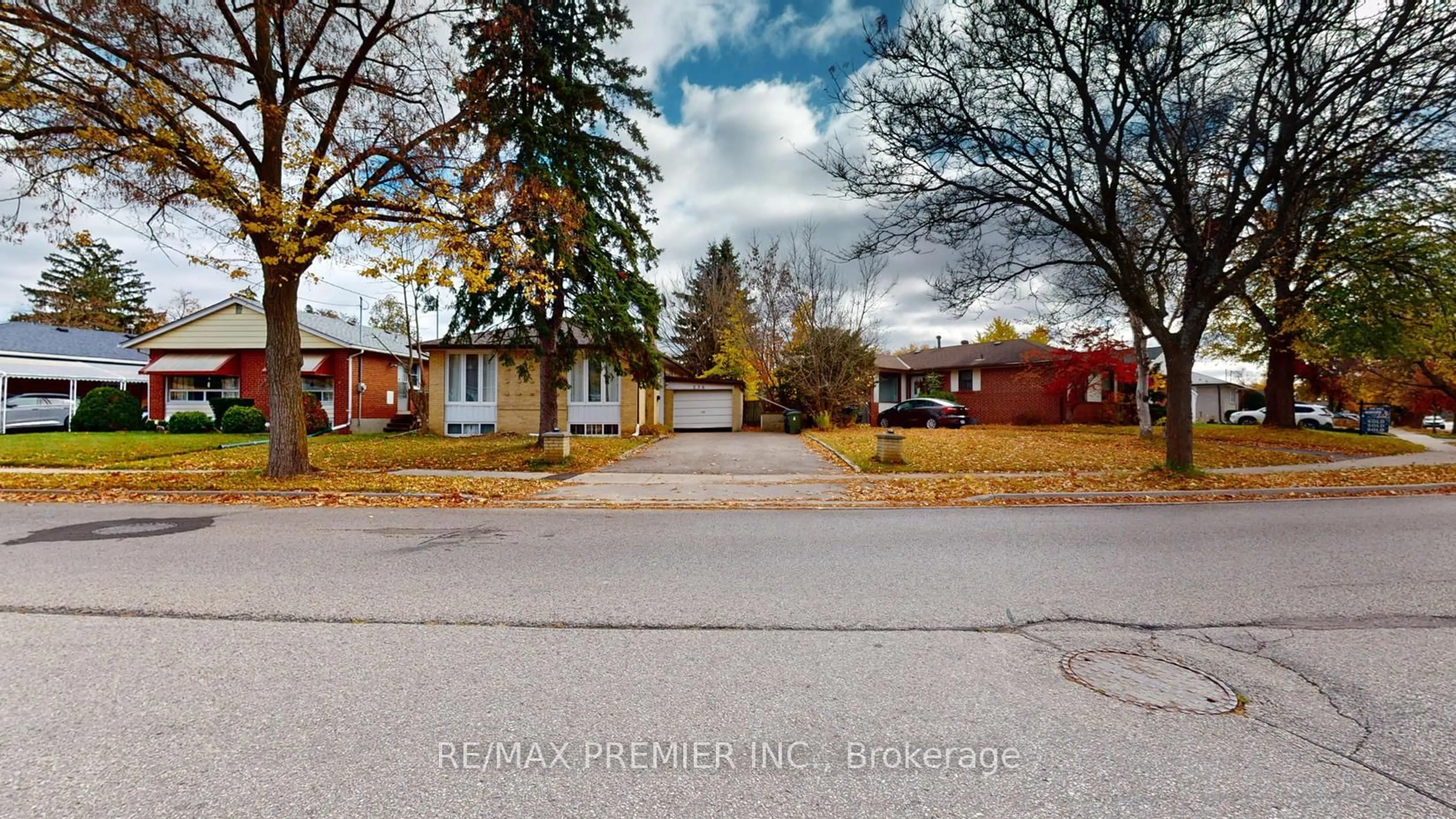 A pic from outside/outdoor area/front of a property/back of a property/a pic from drone, street for 236 Thistle Down Blvd, Toronto Ontario M9V 1K7