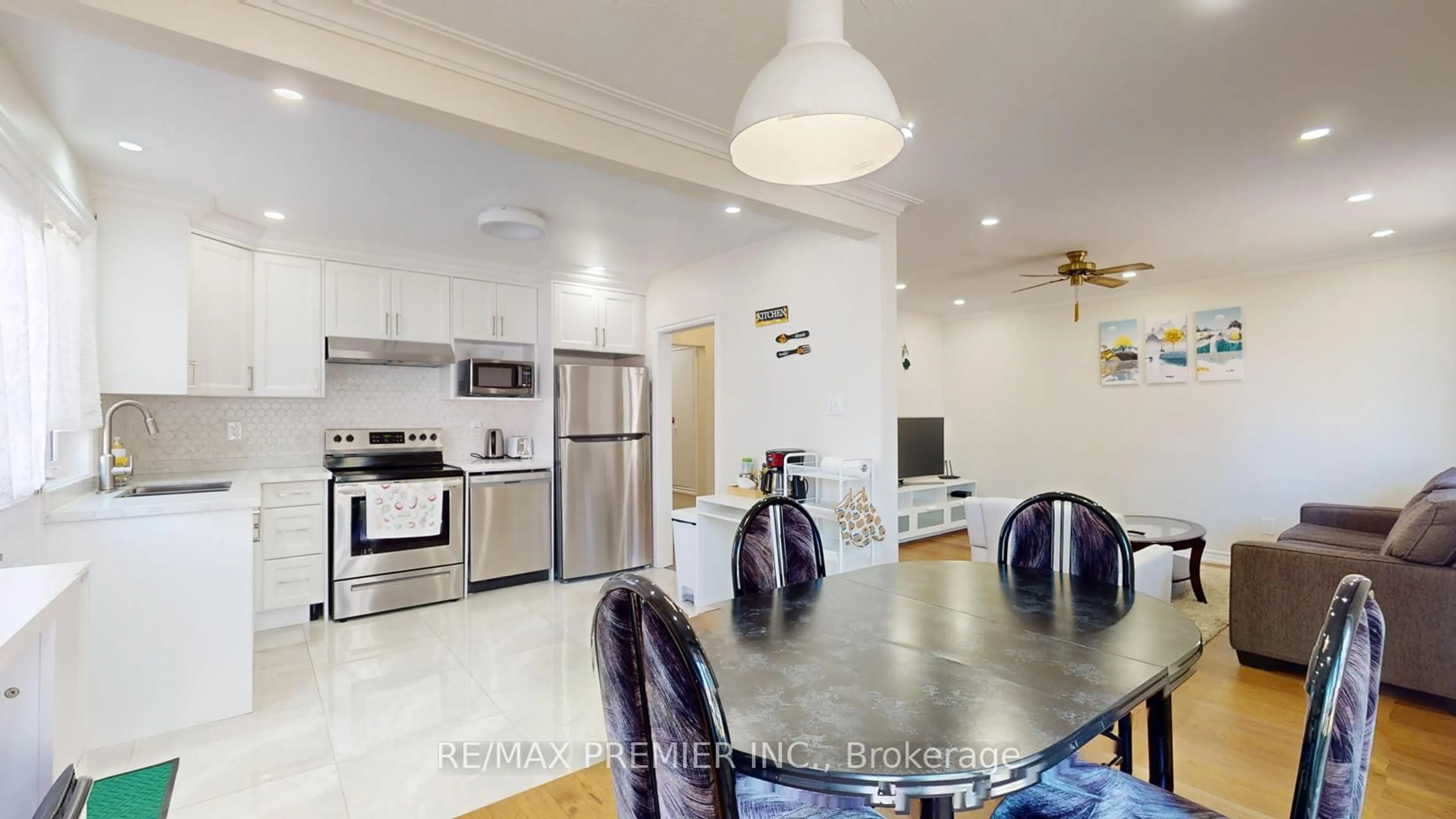 Open concept kitchen, ceramic/tile floor for 236 Thistle Down Blvd, Toronto Ontario M9V 1K7