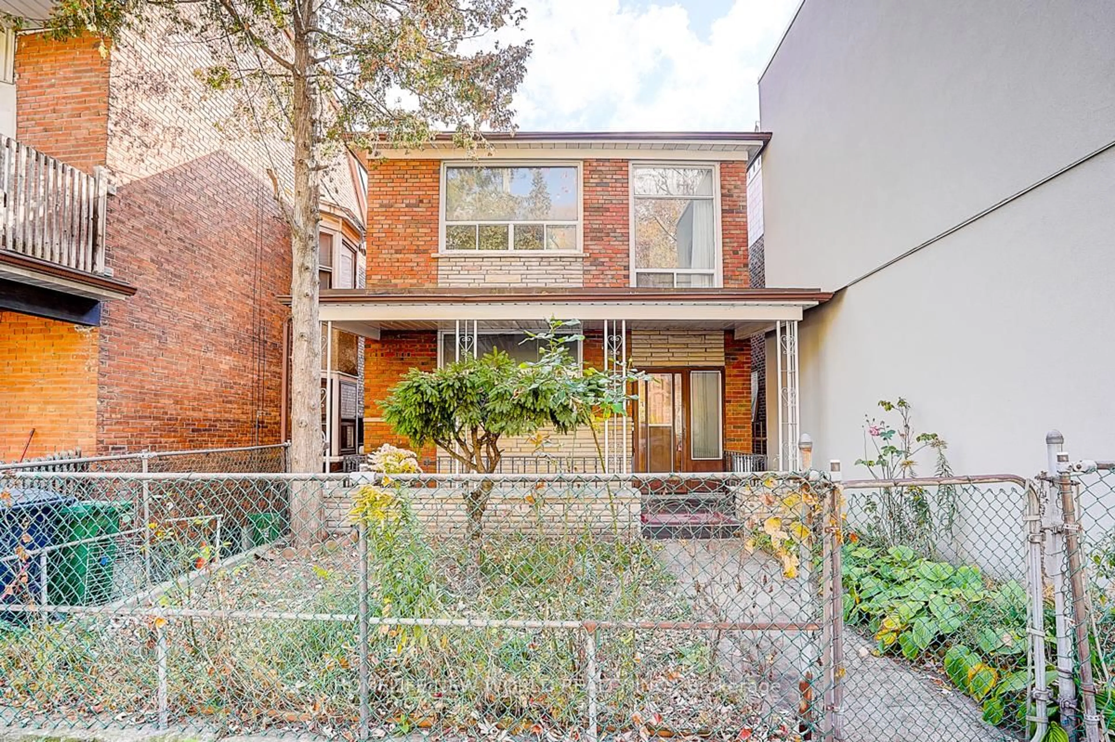 Home with brick exterior material, street for 1263 Davenport Rd, Toronto Ontario M6H 2H2