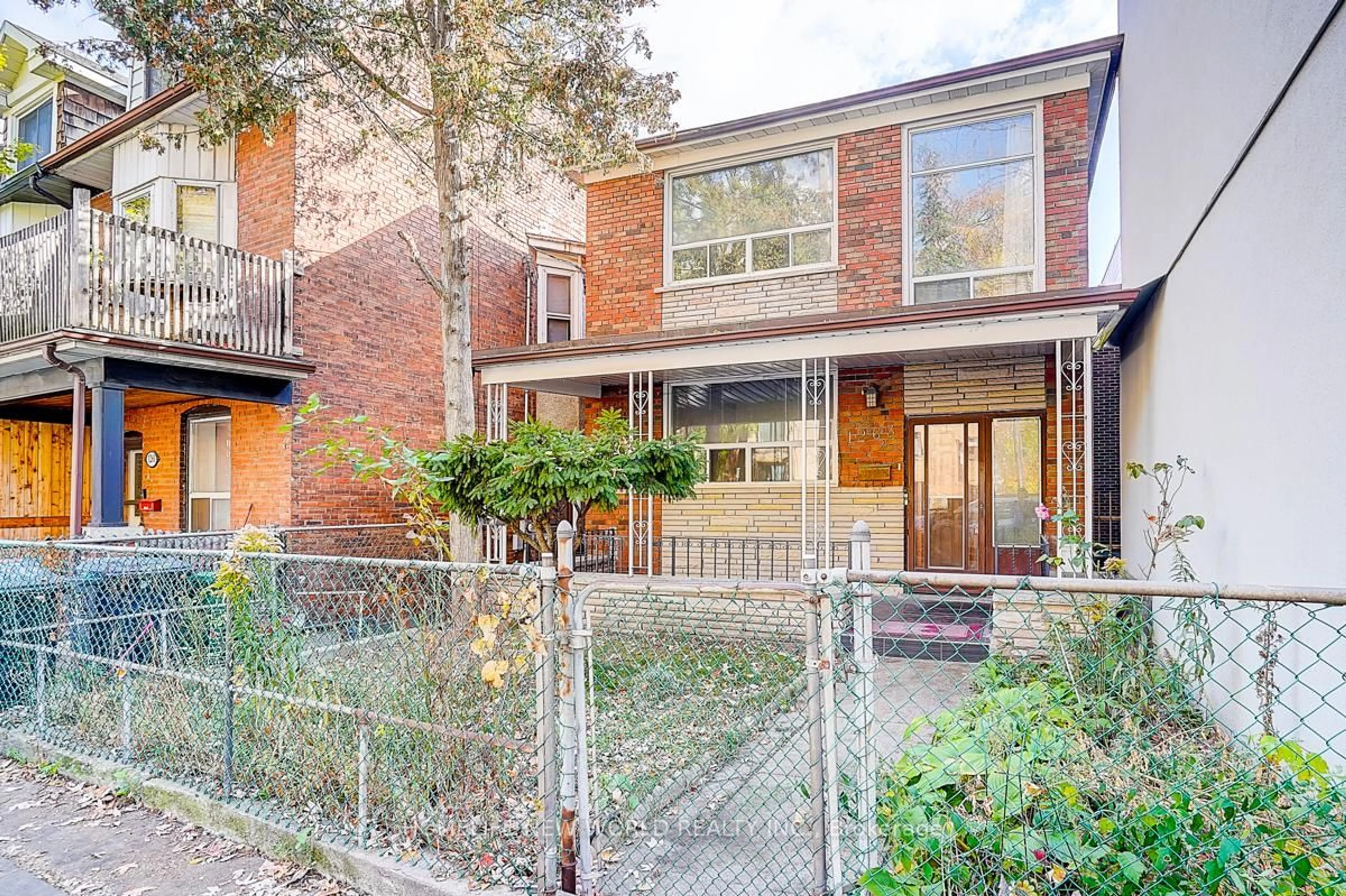 Home with brick exterior material, street for 1263 Davenport Rd, Toronto Ontario M6H 2H2