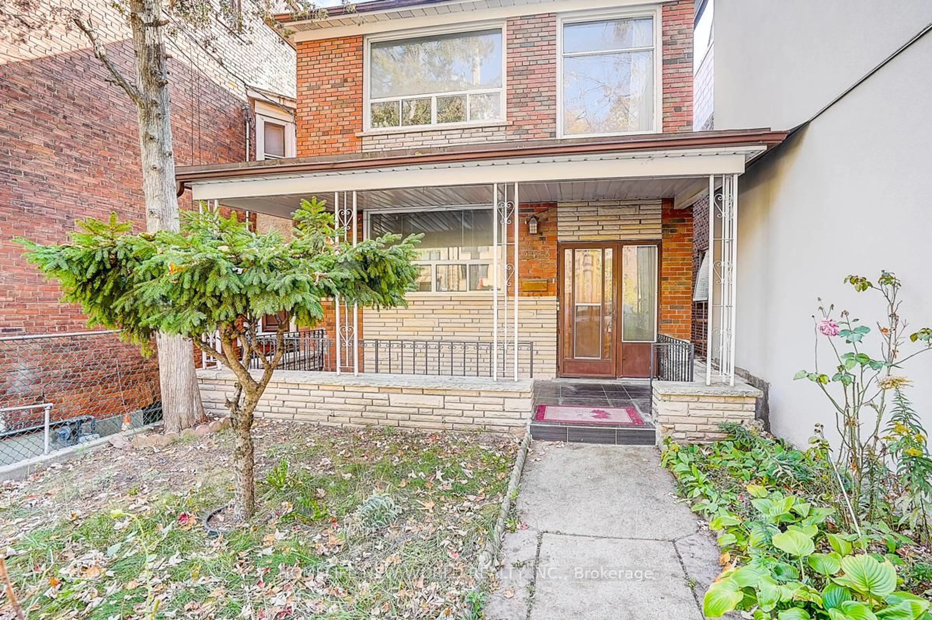 Home with brick exterior material, street for 1263 Davenport Rd, Toronto Ontario M6H 2H2