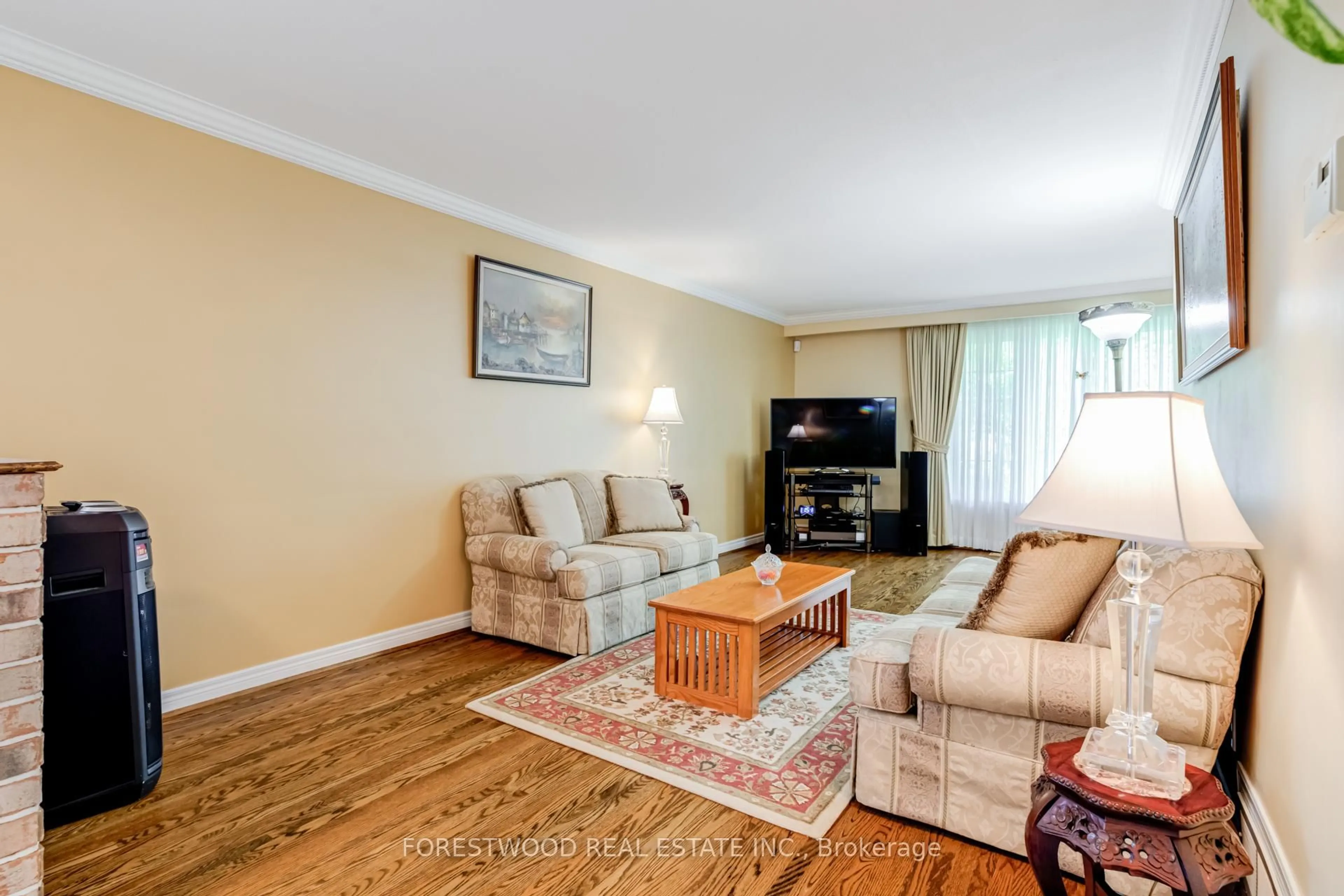 Living room with furniture, wood/laminate floor for 1192 Chada Ave, Mississauga Ontario L5C 1P9