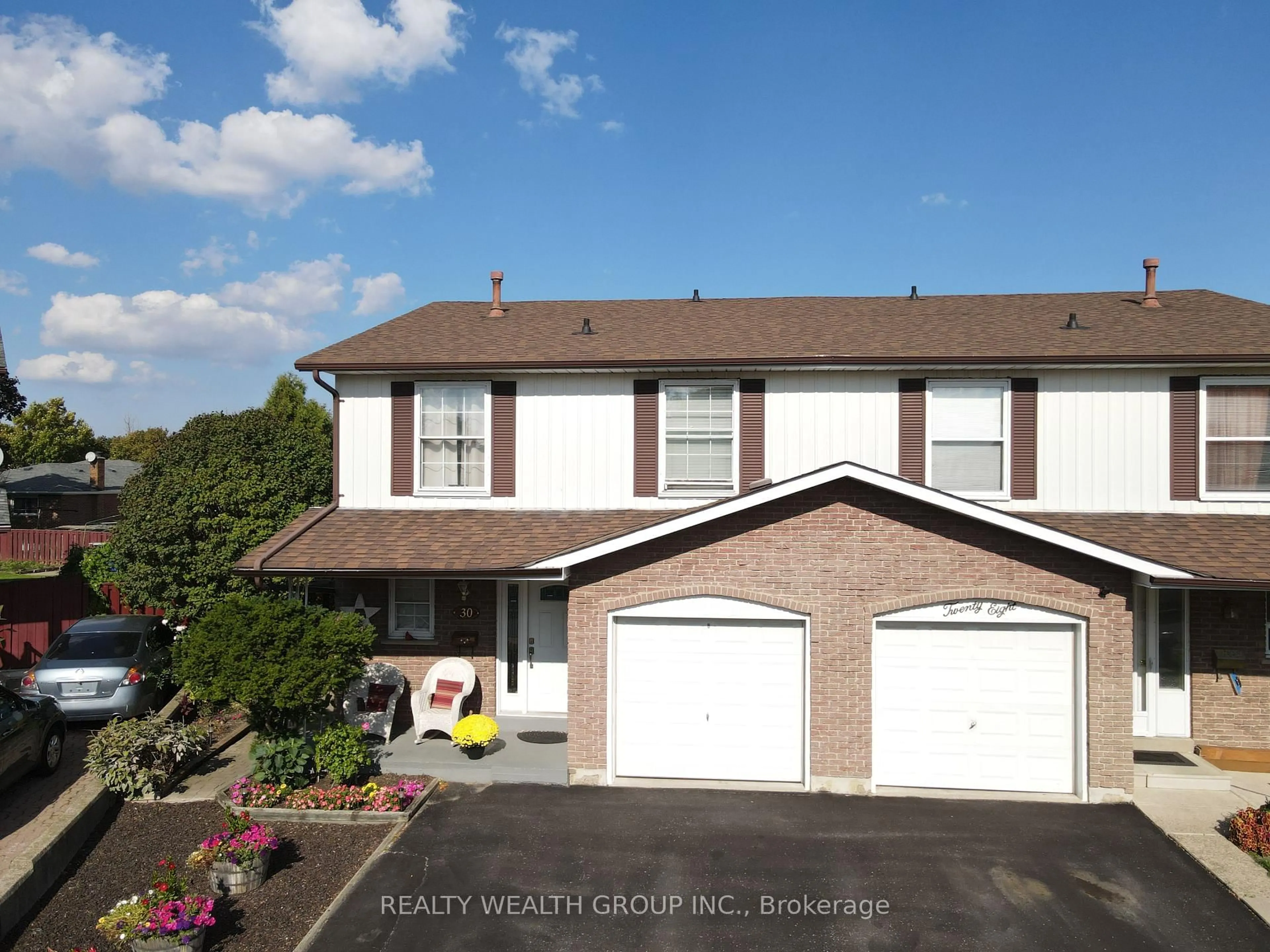 Home with vinyl exterior material, unknown for 30 Ivybridge Dr, Brampton Ontario L6V 2X2