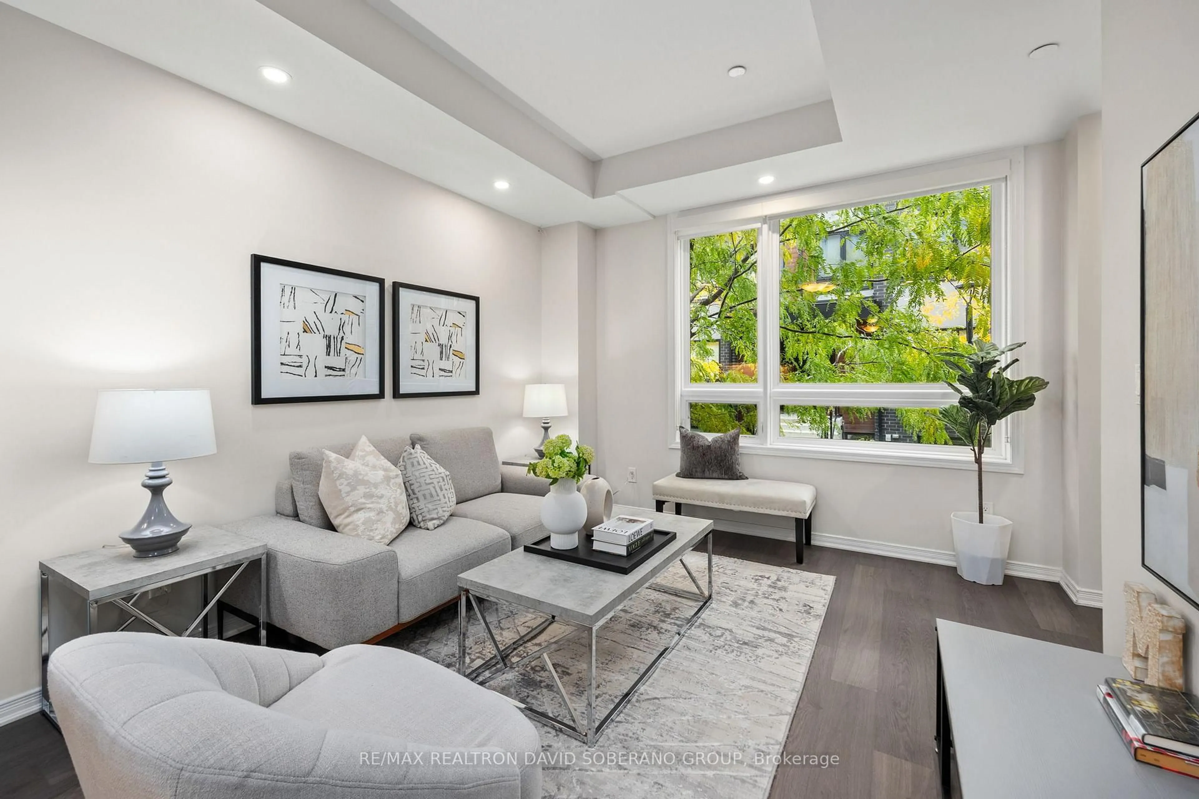 Living room with furniture, unknown for 1120 Briar Hill Ave #202, Toronto Ontario M6B 0A9