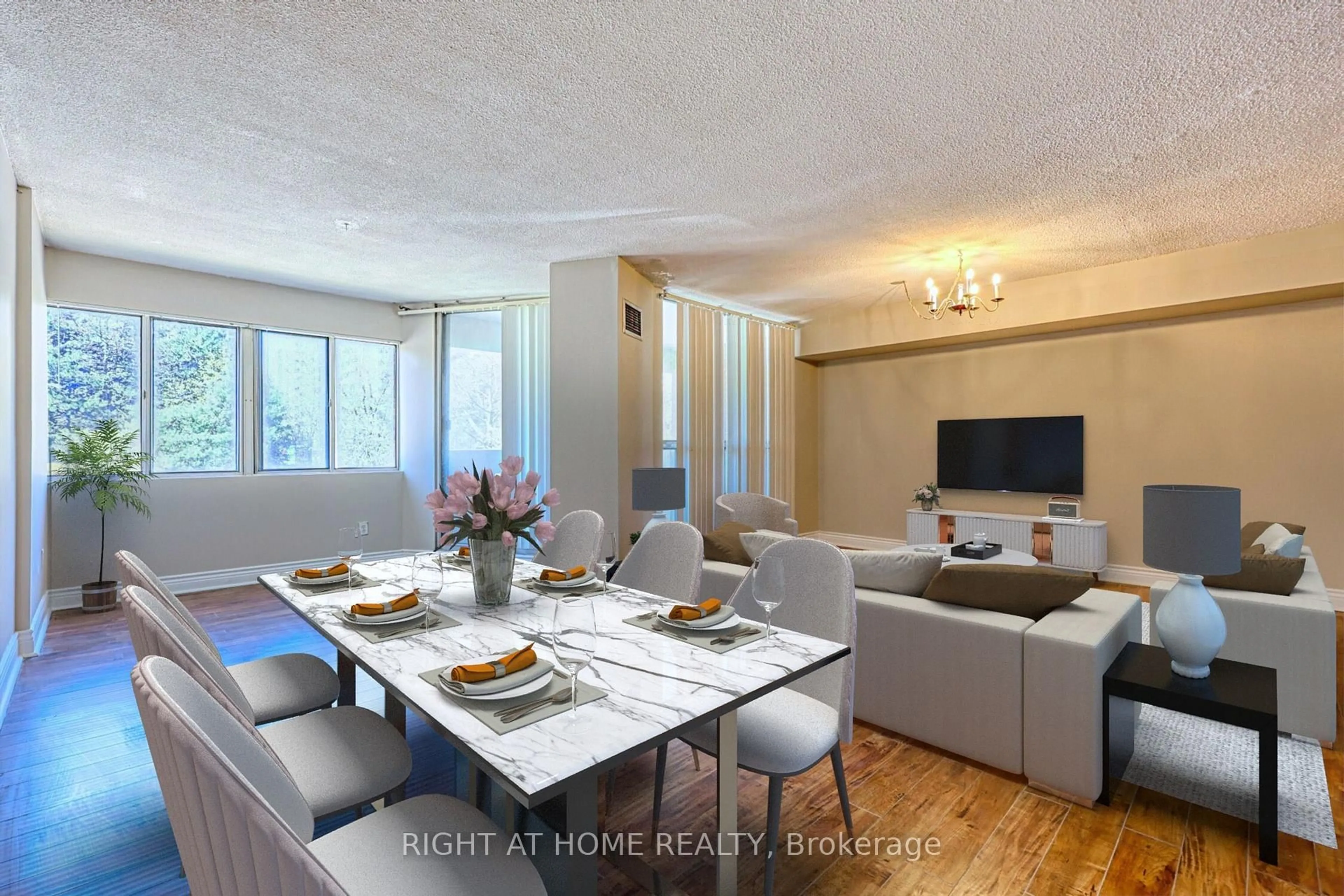 Living room with furniture, wood/laminate floor for 1580 Mississauga Valy #205, Mississauga Ontario L5A 3T8