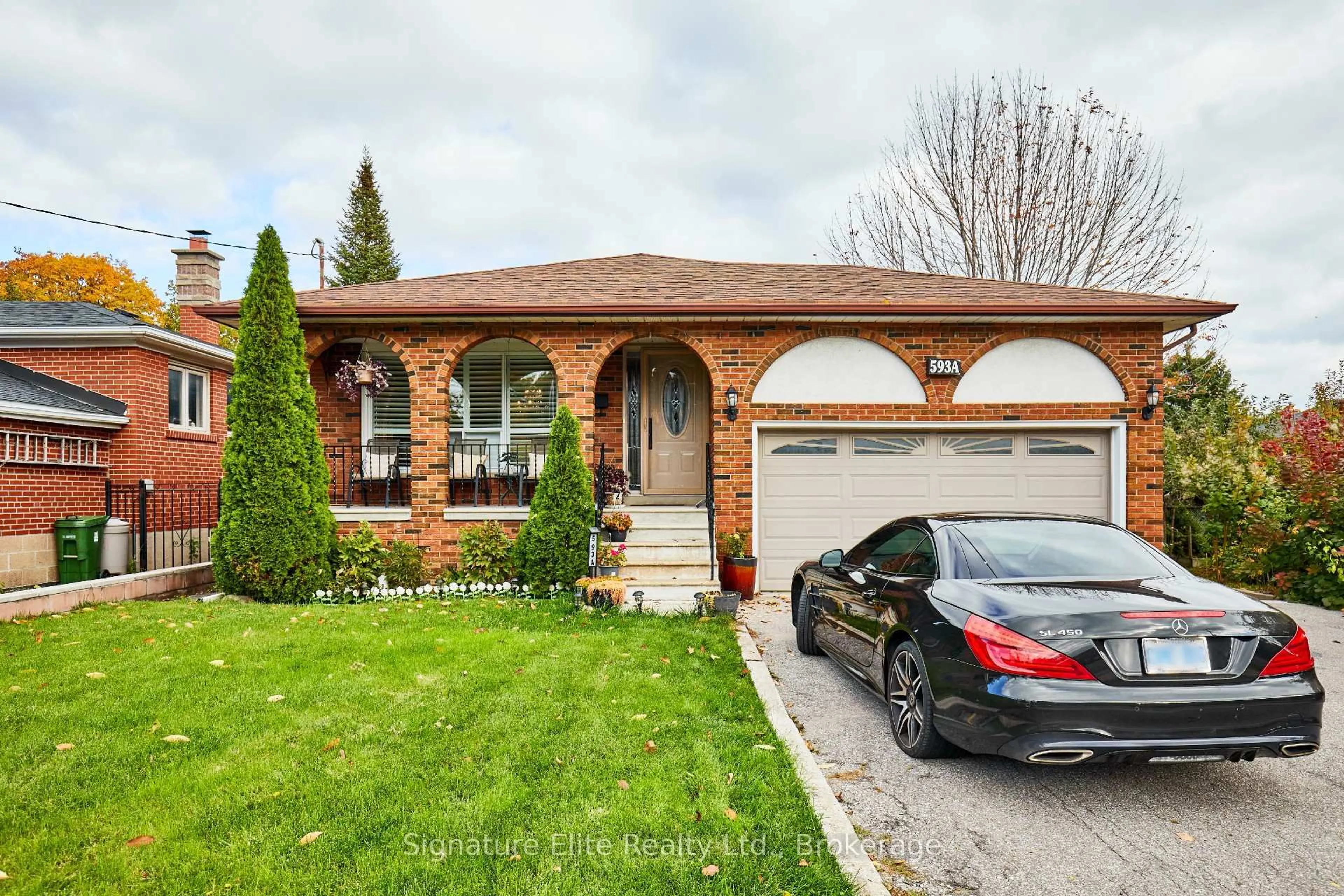 Home with brick exterior material, street for 593A Scarlett Rd, Toronto Ontario M9P 2S6