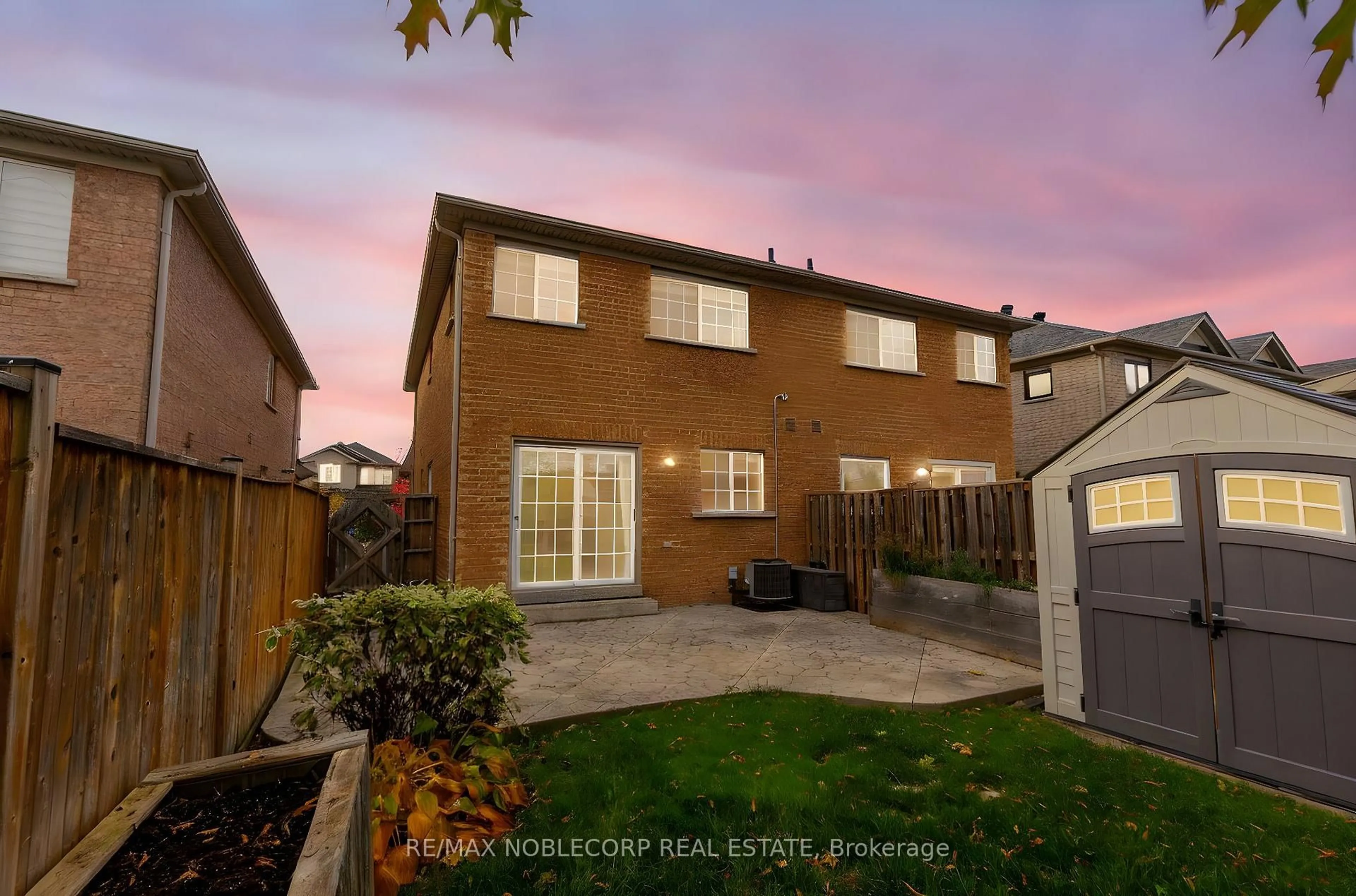 A pic from outside/outdoor area/front of a property/back of a property/a pic from drone, street for 54 Lawren Harris Cres, Caledon Ontario L7E 2W8