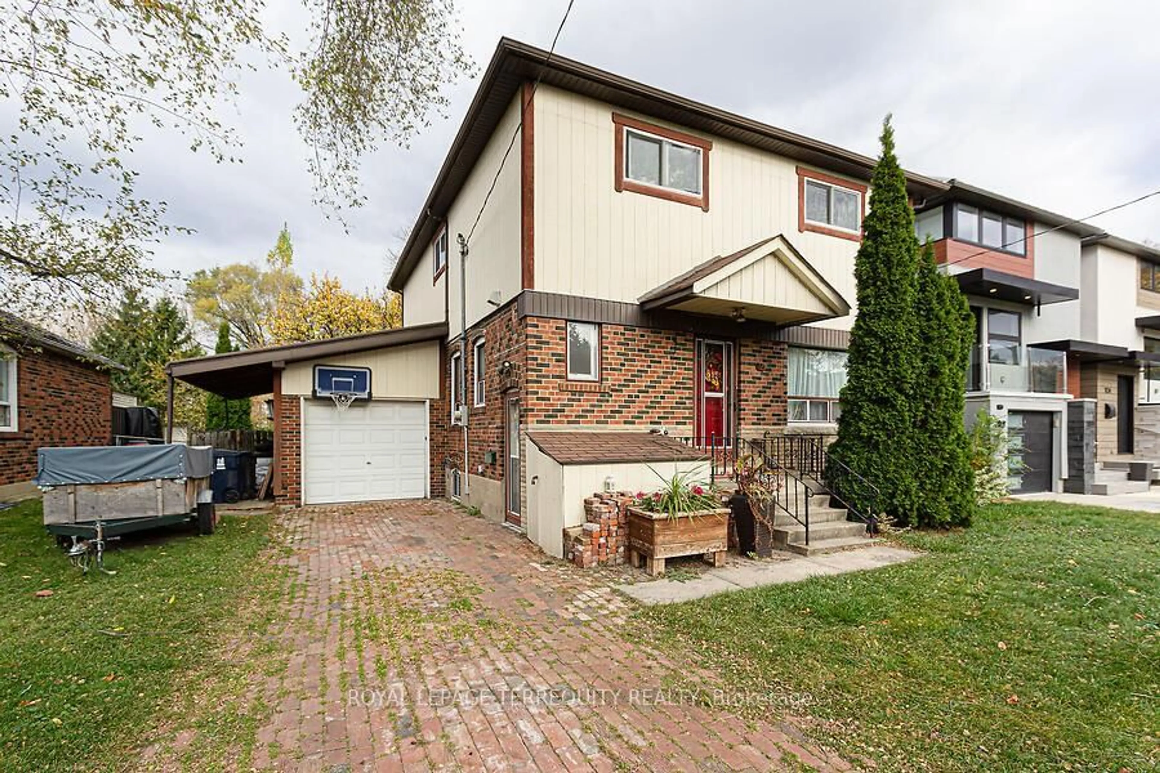 Home with brick exterior material, street for 12 Chauncey Ave, Toronto Ontario M8Z 2Z3