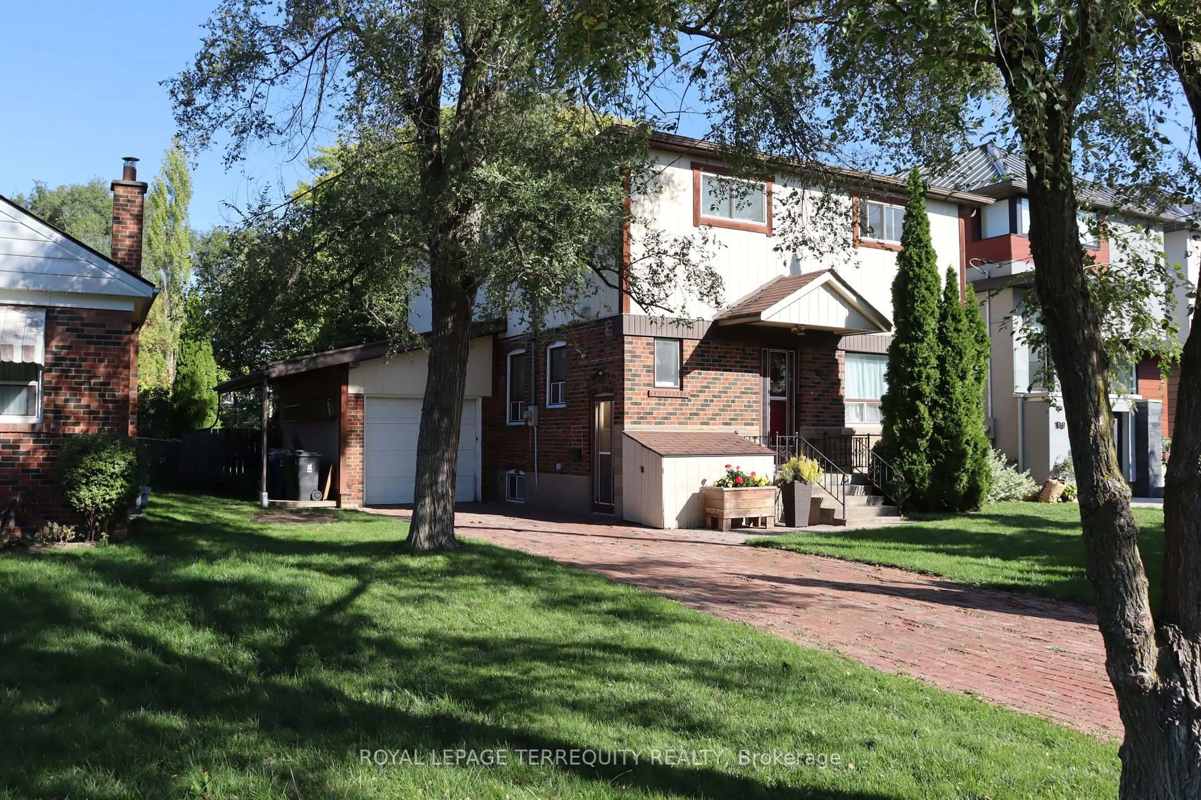 Home with brick exterior material, street for 12 Chauncey Ave, Toronto Ontario M8Z 2Z3