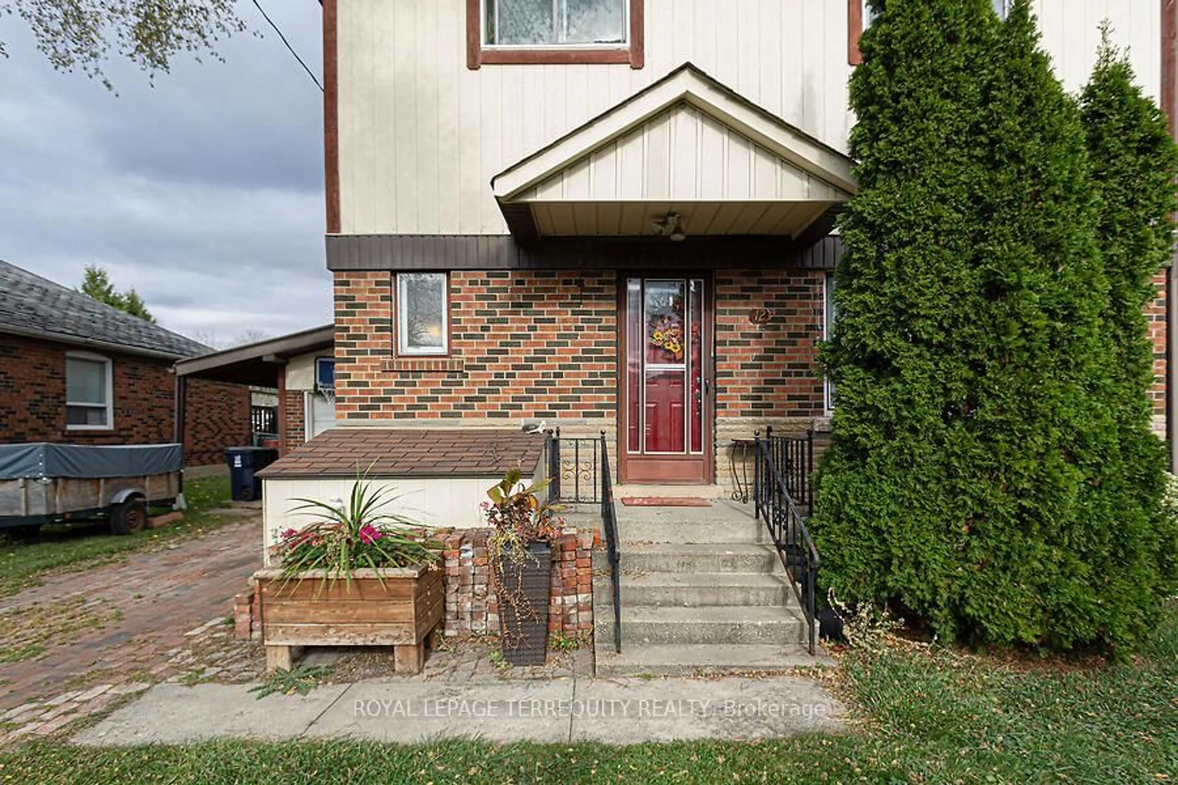 Home with brick exterior material, street for 12 Chauncey Ave, Toronto Ontario M8Z 2Z3