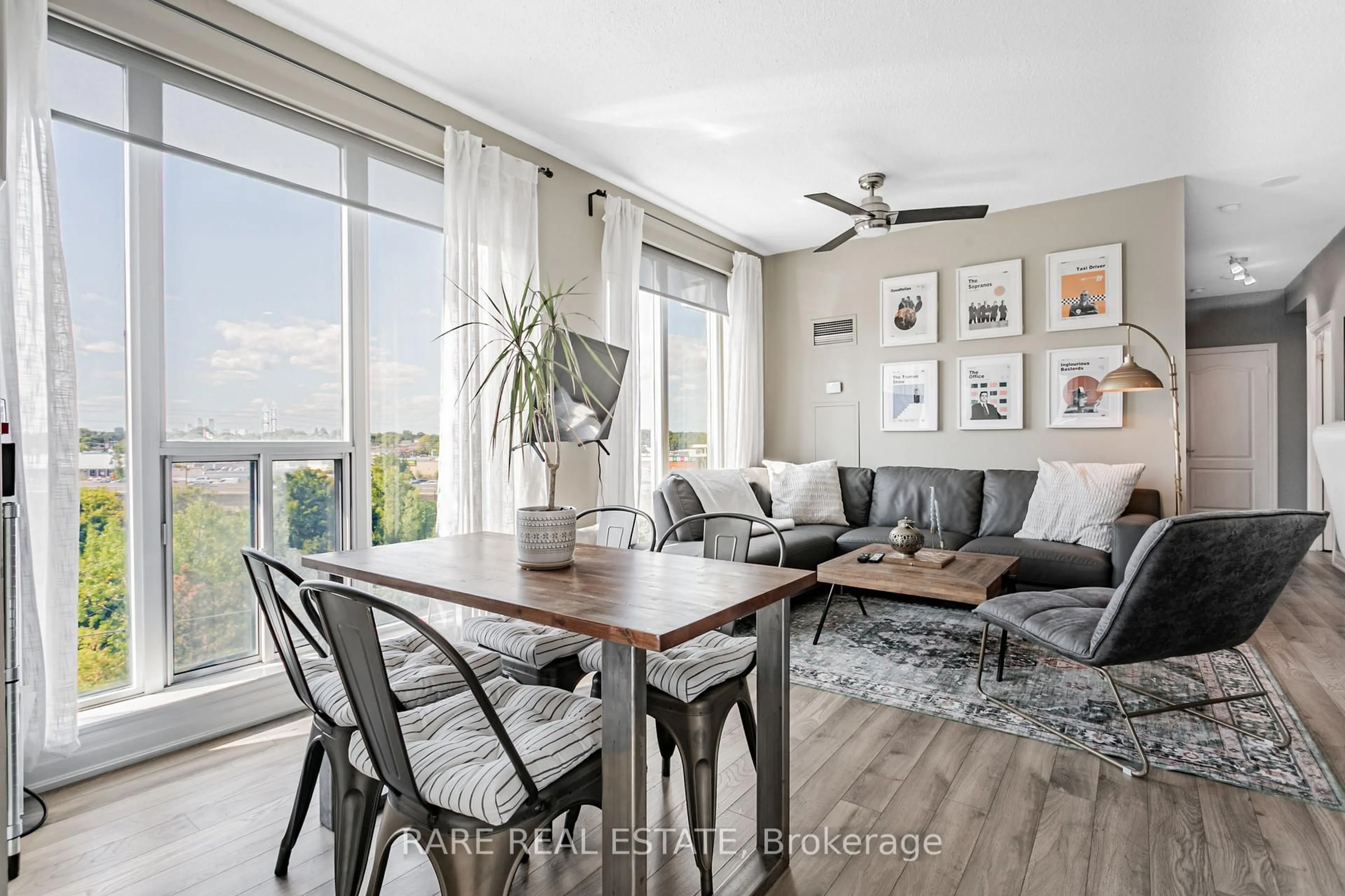 Living room with furniture, wood/laminate floor for 2119 Lake Shore Blvd #703, Toronto Ontario M8V 4E8