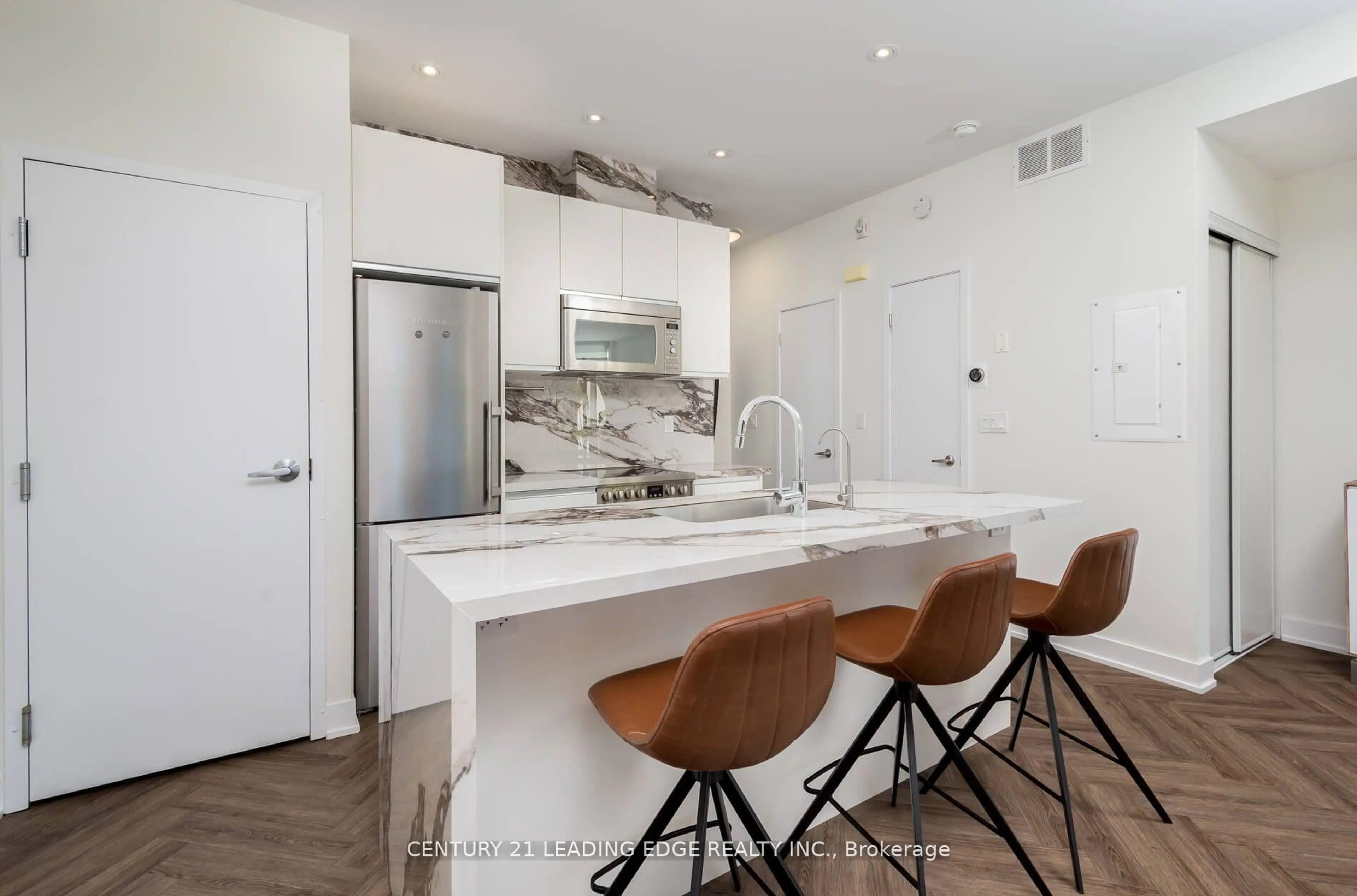 Open concept kitchen, ceramic/tile floor for 441 Jane St #204, Toronto Ontario M6S 3Z9