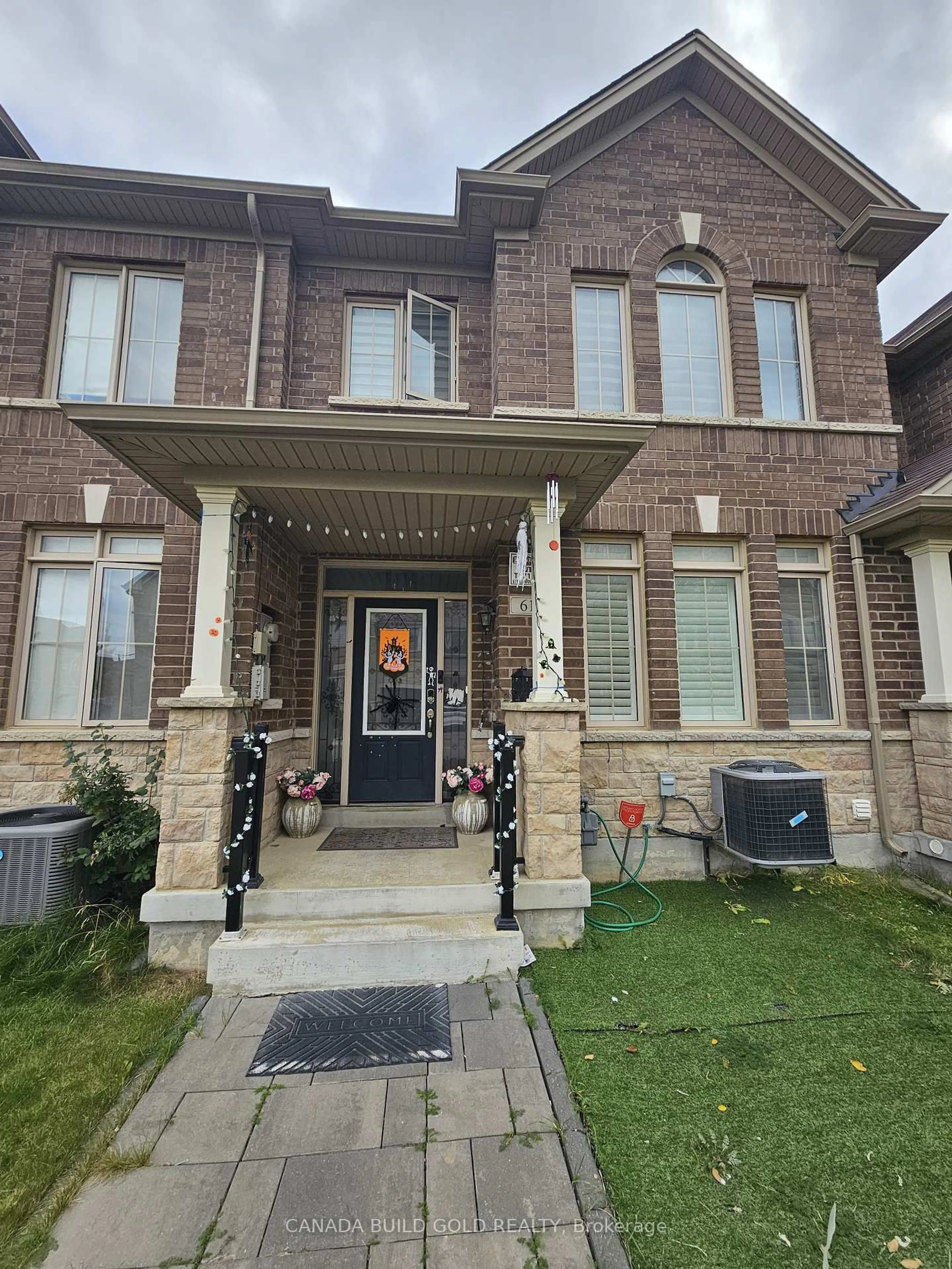 Home with brick exterior material, street for 61 Yellowknife Rd, Brampton Ontario L6R 3X5