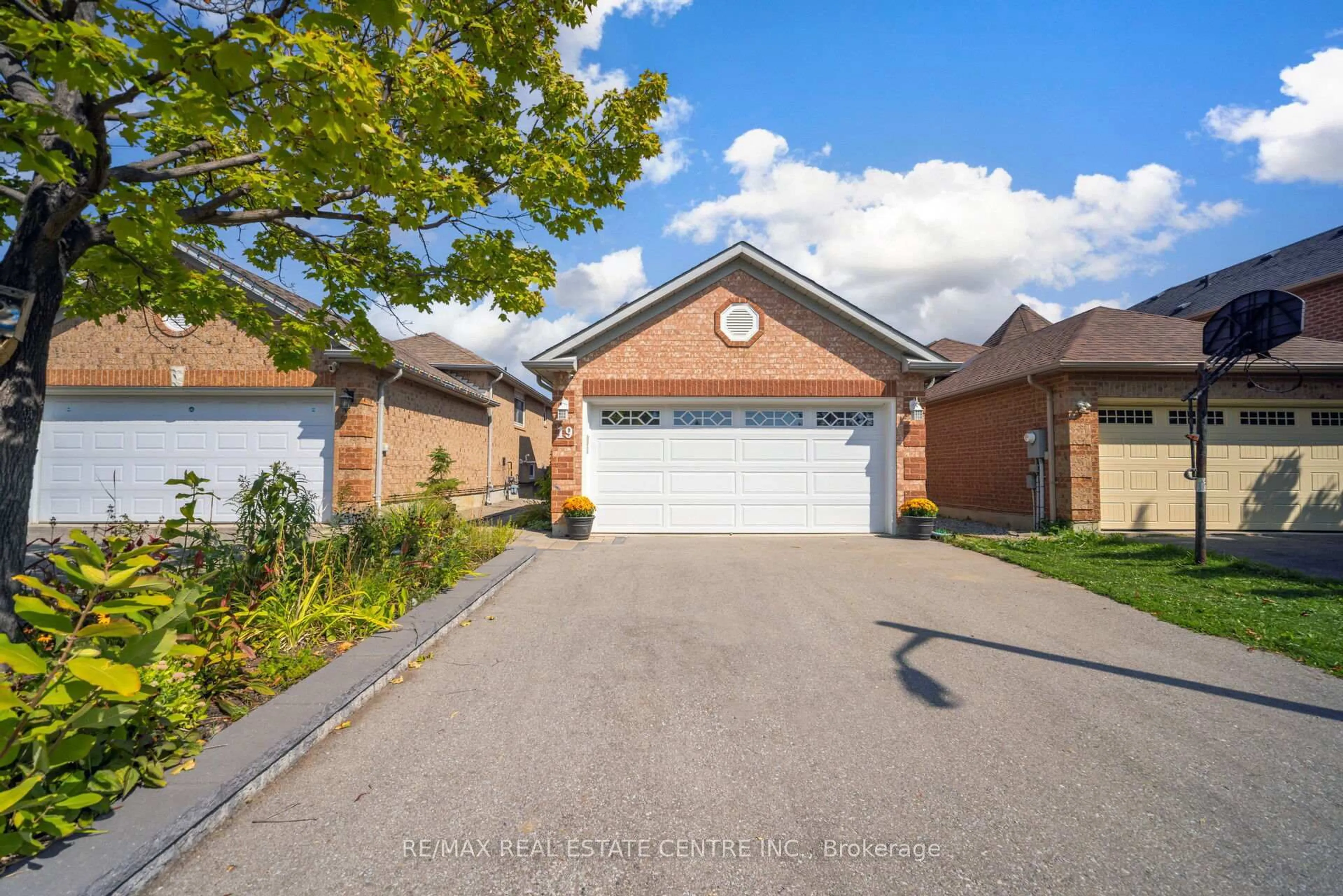 Home with brick exterior material, street for 19 Silkwood Cres, Brampton Ontario L6X 4L1